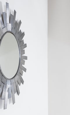 Wall mirror made of shaped aluminum sheet, produced by Bottega Gadda