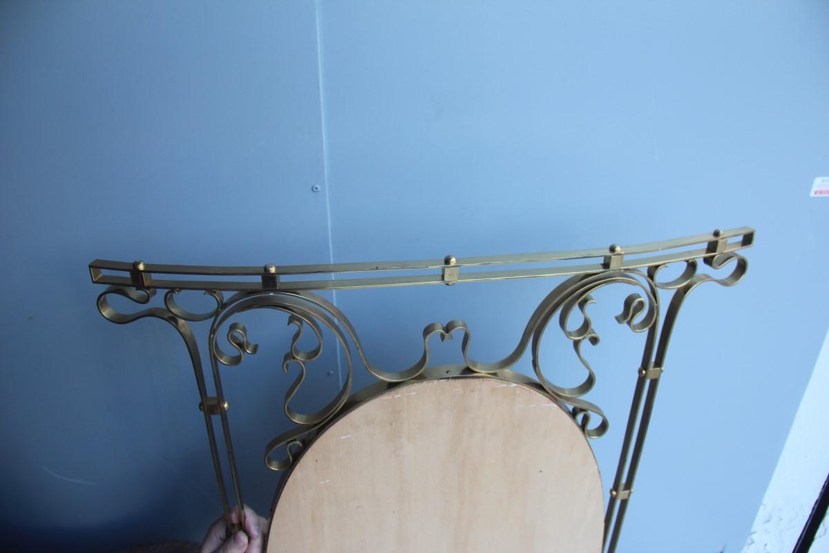 Mid-20th Century Wall Mirror Made of Shaped Solid Brass and Hand-Worked French Design, 1950 For Sale