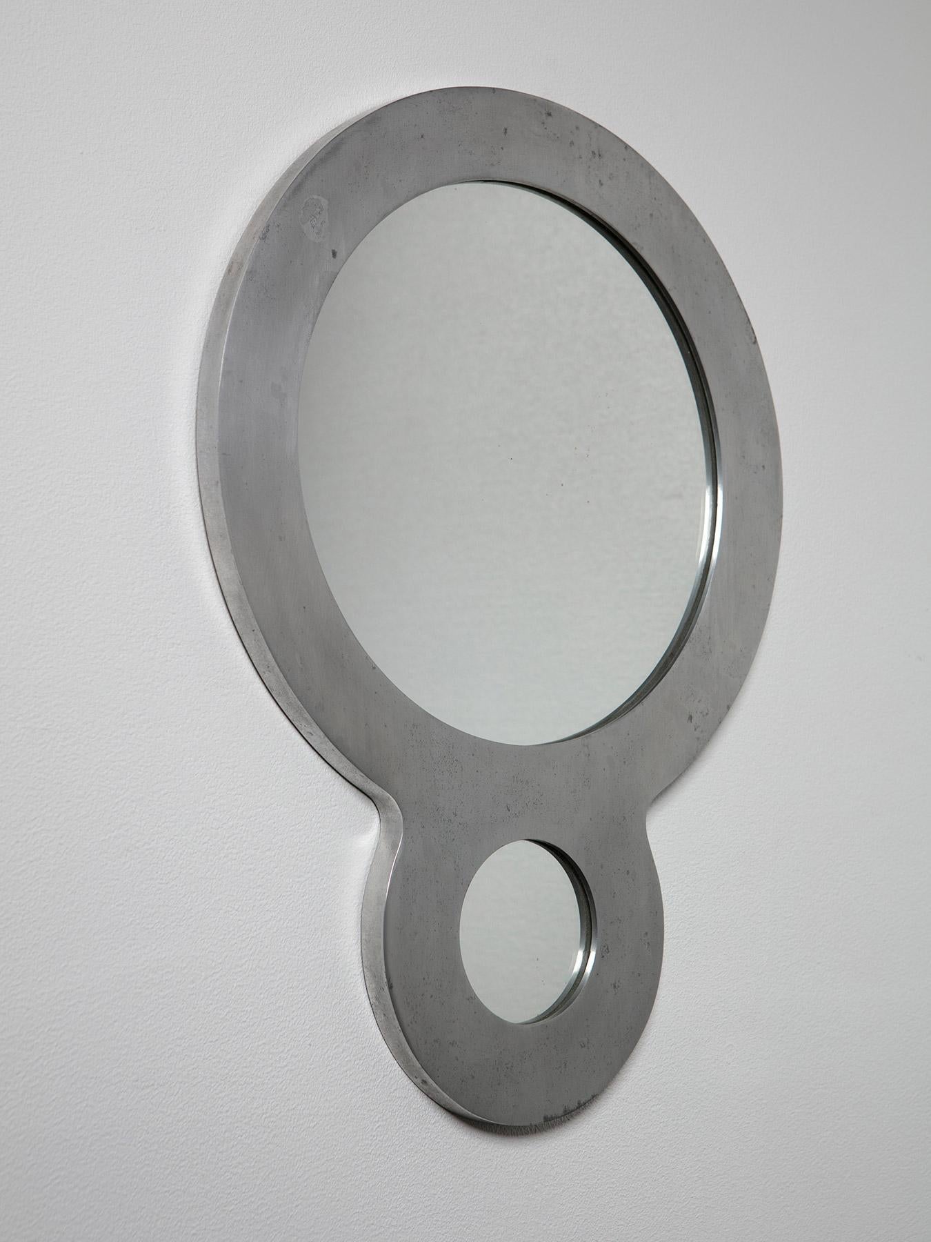 Rare mirror model 427 by Albert Leclerc for La Galleria Il Sestante. 
Part of a collection of objects in aluminum, the piece can be used on both vertical ways shown. 