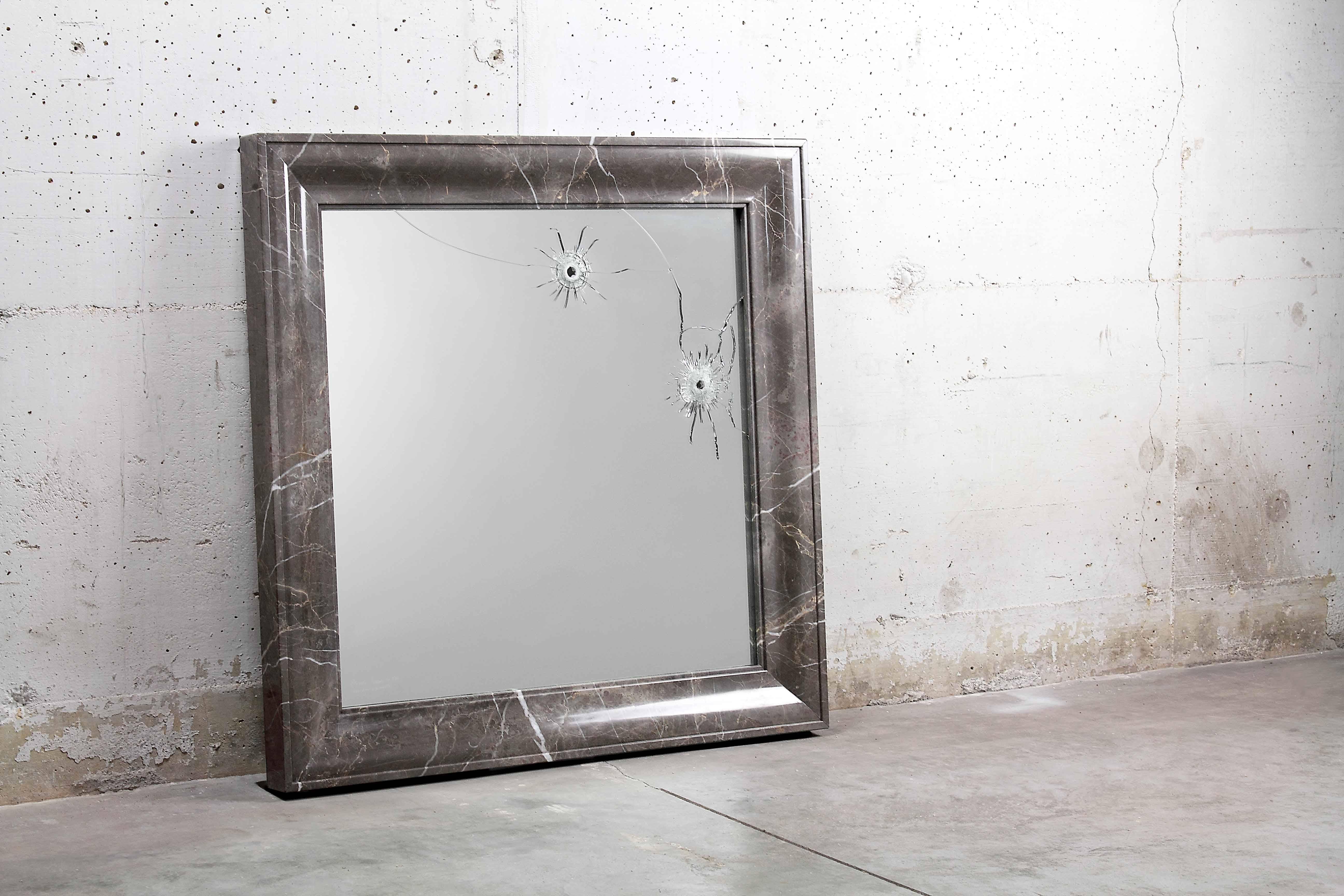 The 'Seven Years' wall mirror is made of security-glass, mirror hit by gunshots and frame in polished Imperial grey Marble.

Mirror dimension: L 85 x W 85 cm. Dimensions are customizable.

Limited Edition of 15.

Each mirror is hand signed by the