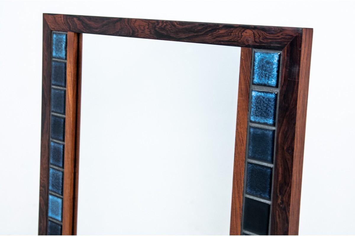 Wall mirror, Denmark, 1970s.
Rosewood frame with blue tiles.
   