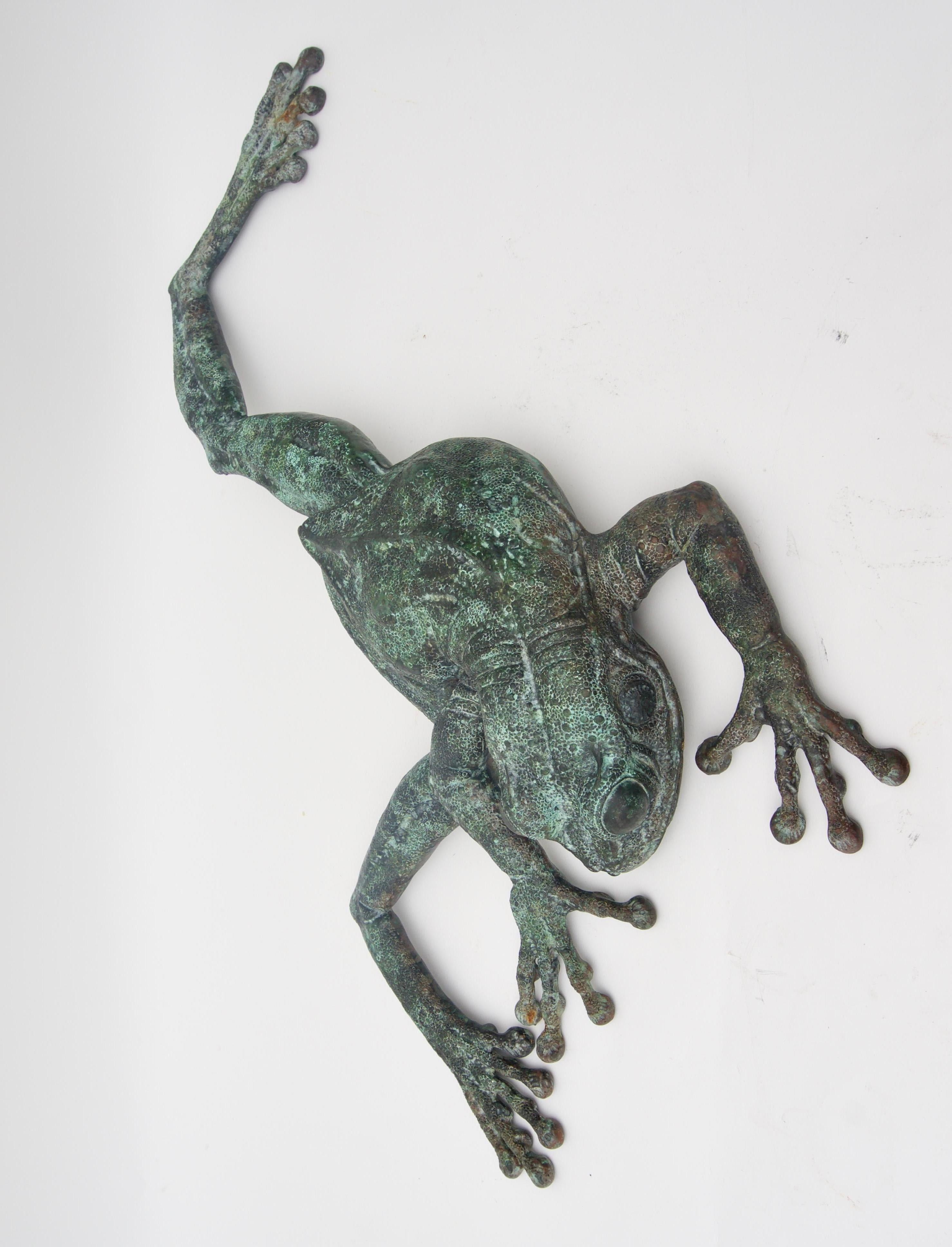 This large scale wall mount bronze sculpture of a geico frog was created by the American artist and sculptor Kathy Spalding and is signed and dated on the verso of the right leg. Spalding is known for your very large scale pieces all done in the