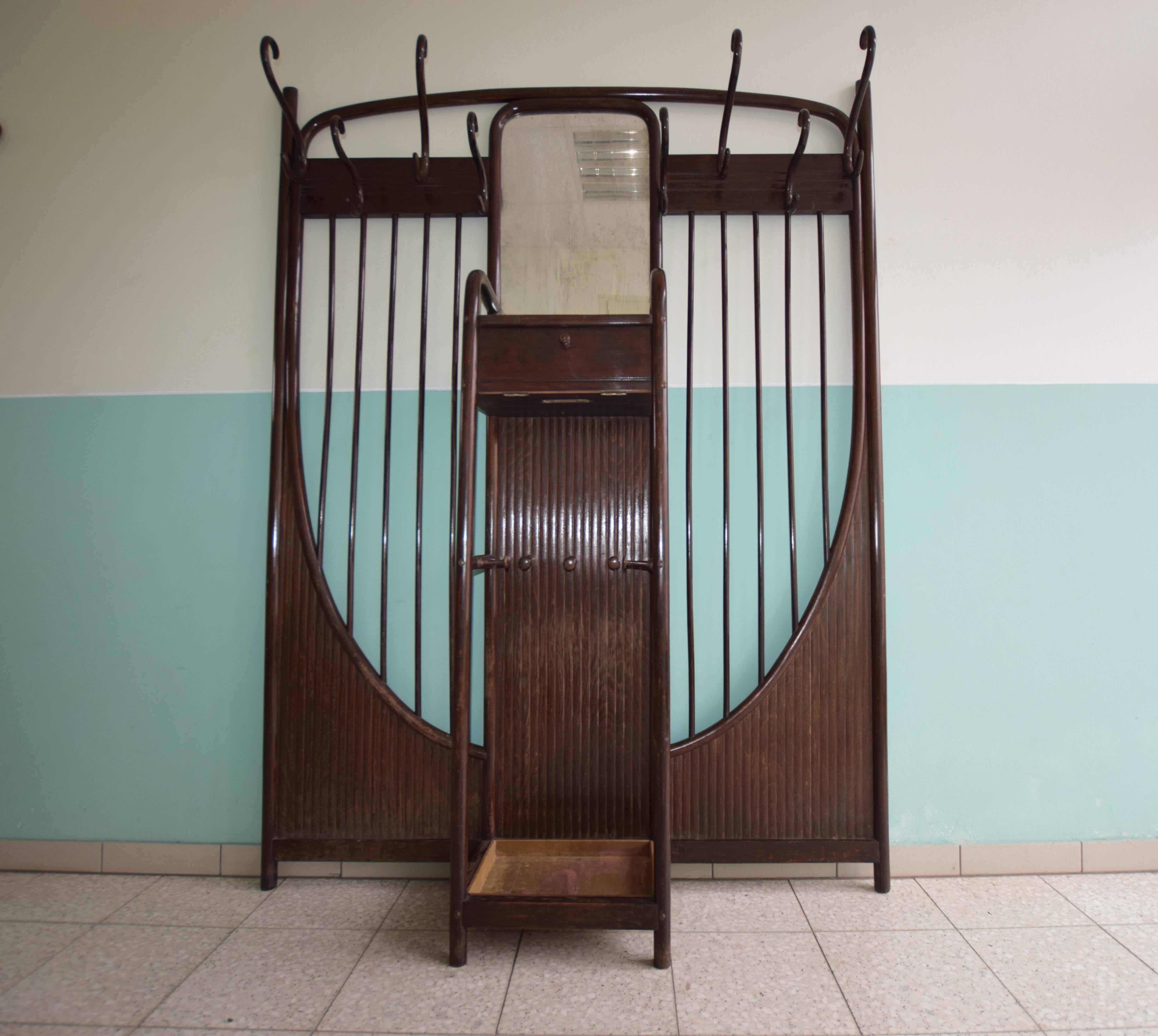 Rare piece from Thonet, model No.6, designed by Otto Wagner, Thonet catalogue 1904, Viennese Art Nouveau, original well preserved, no woodworms, not restored, only cleaned. Bent solid beech wood. 8 coat hooks at the top, Mirror with drawer, the