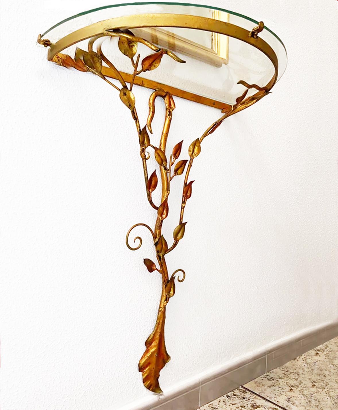Wall Mount Console Table Mid Century Iron Leaves Gold Leaf, France 50s to 70s
Nothing common, this beautiful console is very light and attractive
A matching coat rack is available
Hollewood Regency.
iton forged 
Mid 20th Century Furniture.
Posible