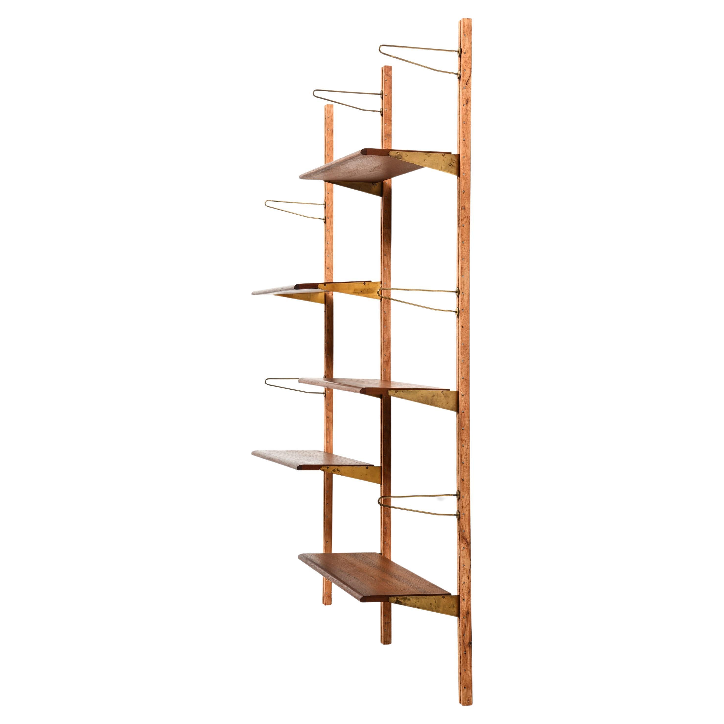 Libreria a muro in teak, faggio e ottone di Finn Juhls, 1956 in vendita