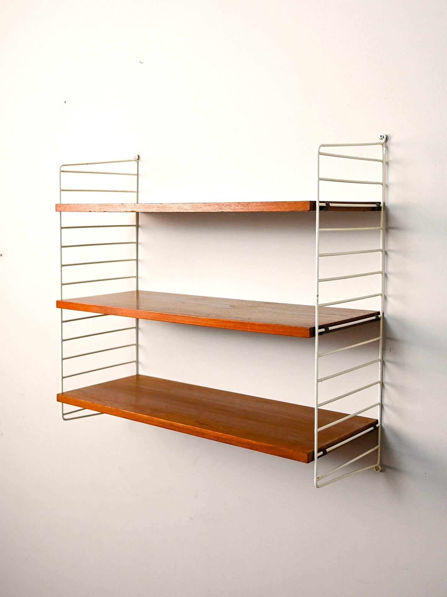 Scandinavian Modern Wall-mounted bookcase with wooden shelves For Sale