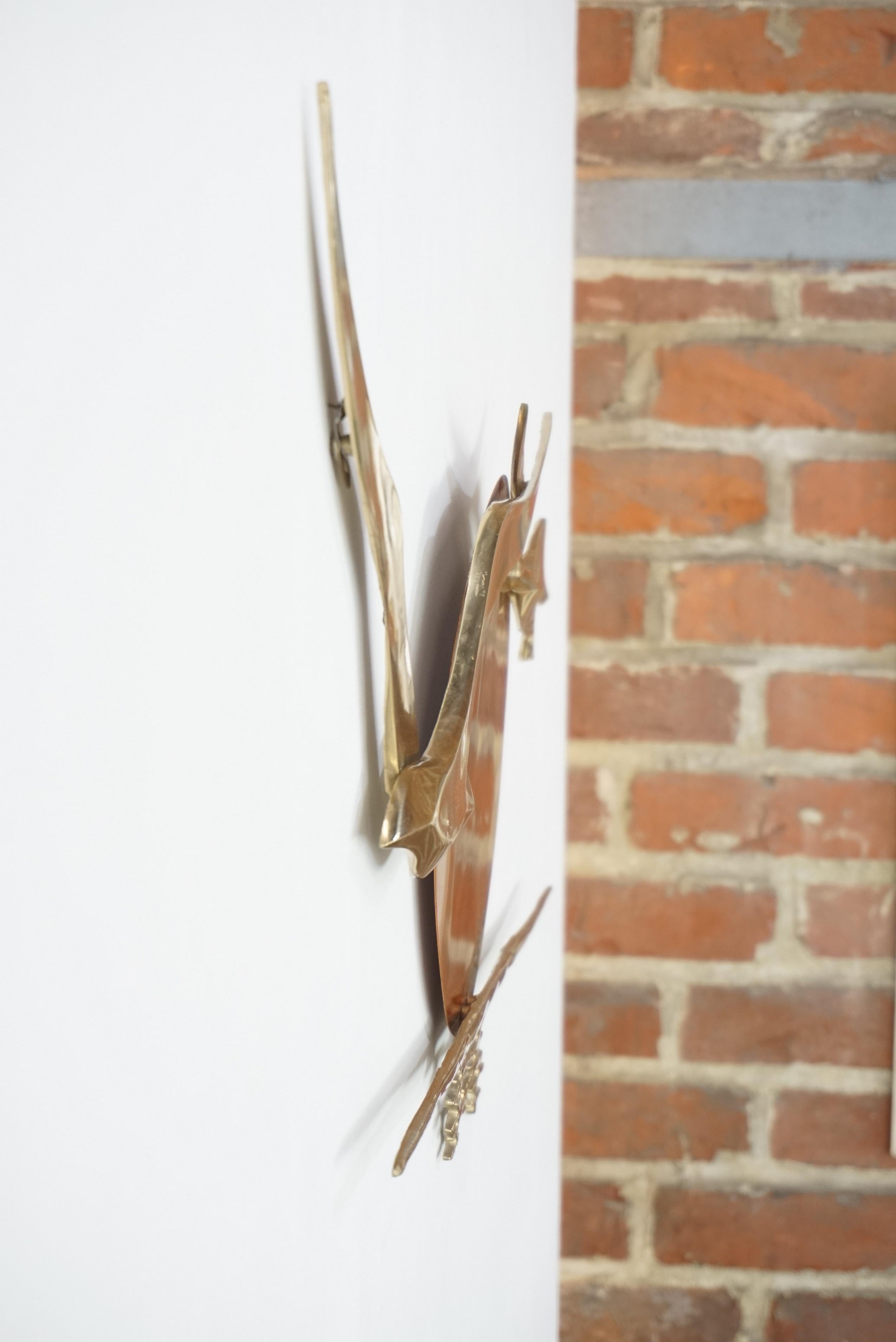 copper bird sculpture
