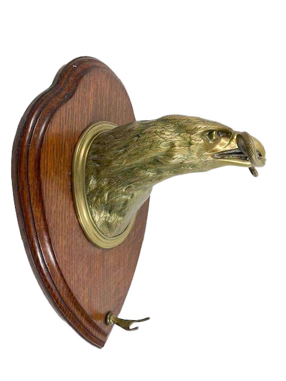 Wall Mounted Brass Eagle Head on Oak Plaque Holding a Dinner Gong by Wm. Tonks For Sale 4