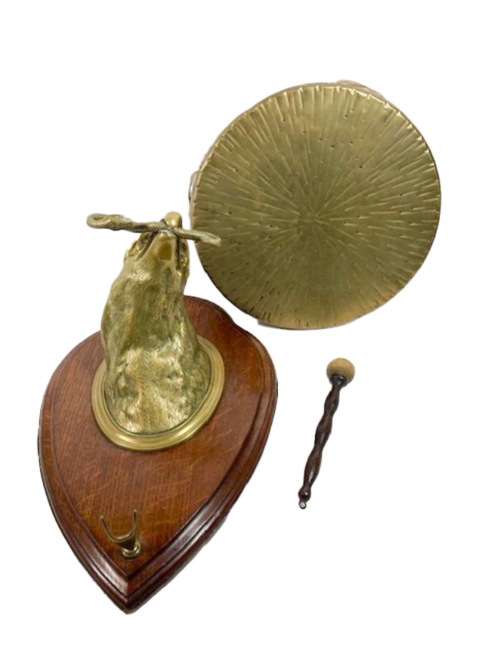 Wall Mounted Brass Eagle Head on Oak Plaque Holding a Dinner Gong by Wm. Tonks For Sale 9