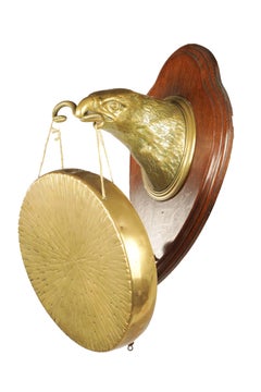 Wall Mounted Brass Eagle Head on Oak Plaque Holding a Dinner Gong by Wm. Tonks