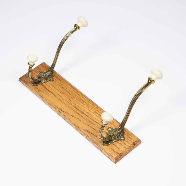 Wall Mounted Brass and Porcelain Hat and Coat Hooks For Sale at 1stDibs