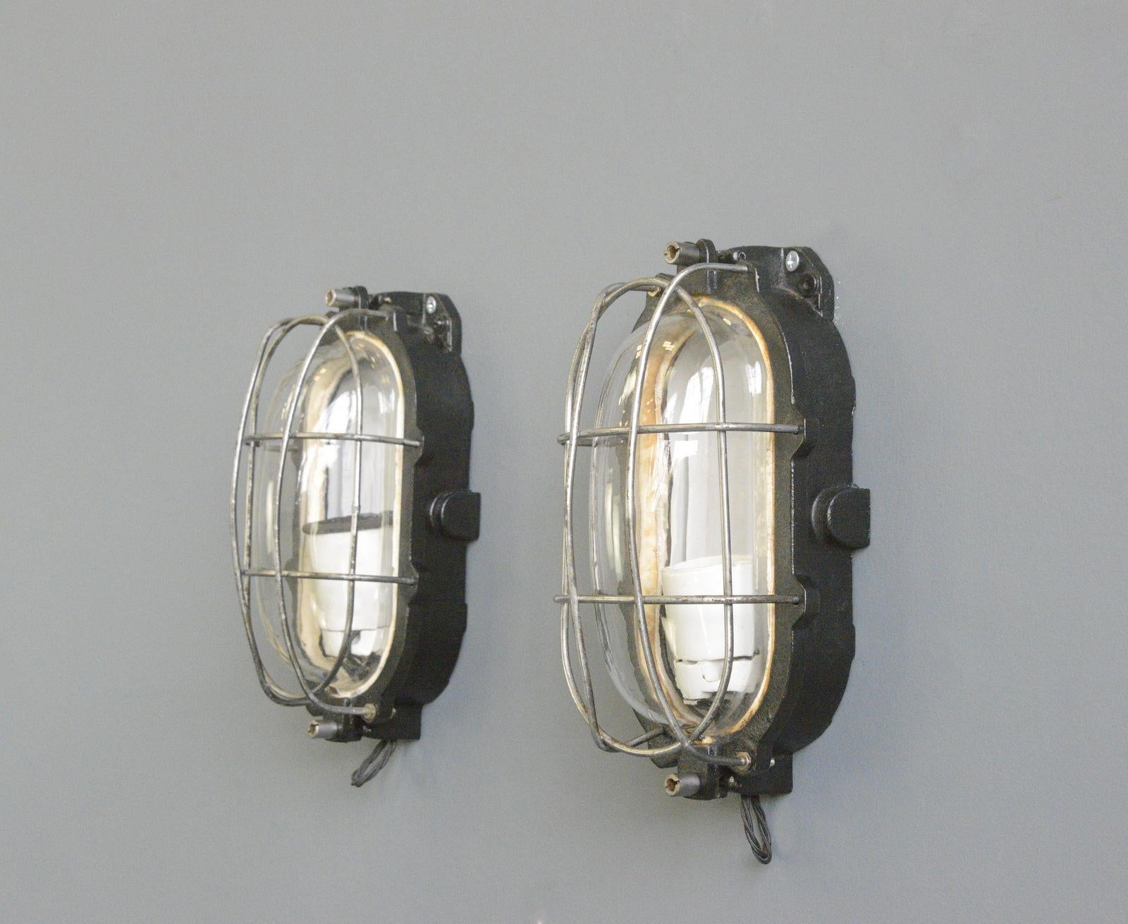 - Cast iron casing 
- Heavy domed glass with protective steel cage
- Takes 1x E27 fitting bulbs
- Can be used both inside and out
- Made by Siemens Schuckert, Berlin
- German ~ 1930s
- 30cm tall x 16cm wide x 14cm deep

Siemens

Siemens &