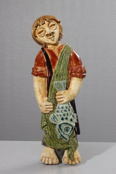 Wall mounted ceramic plaque of a fisherman by Atelier Kerbigot, 1960s