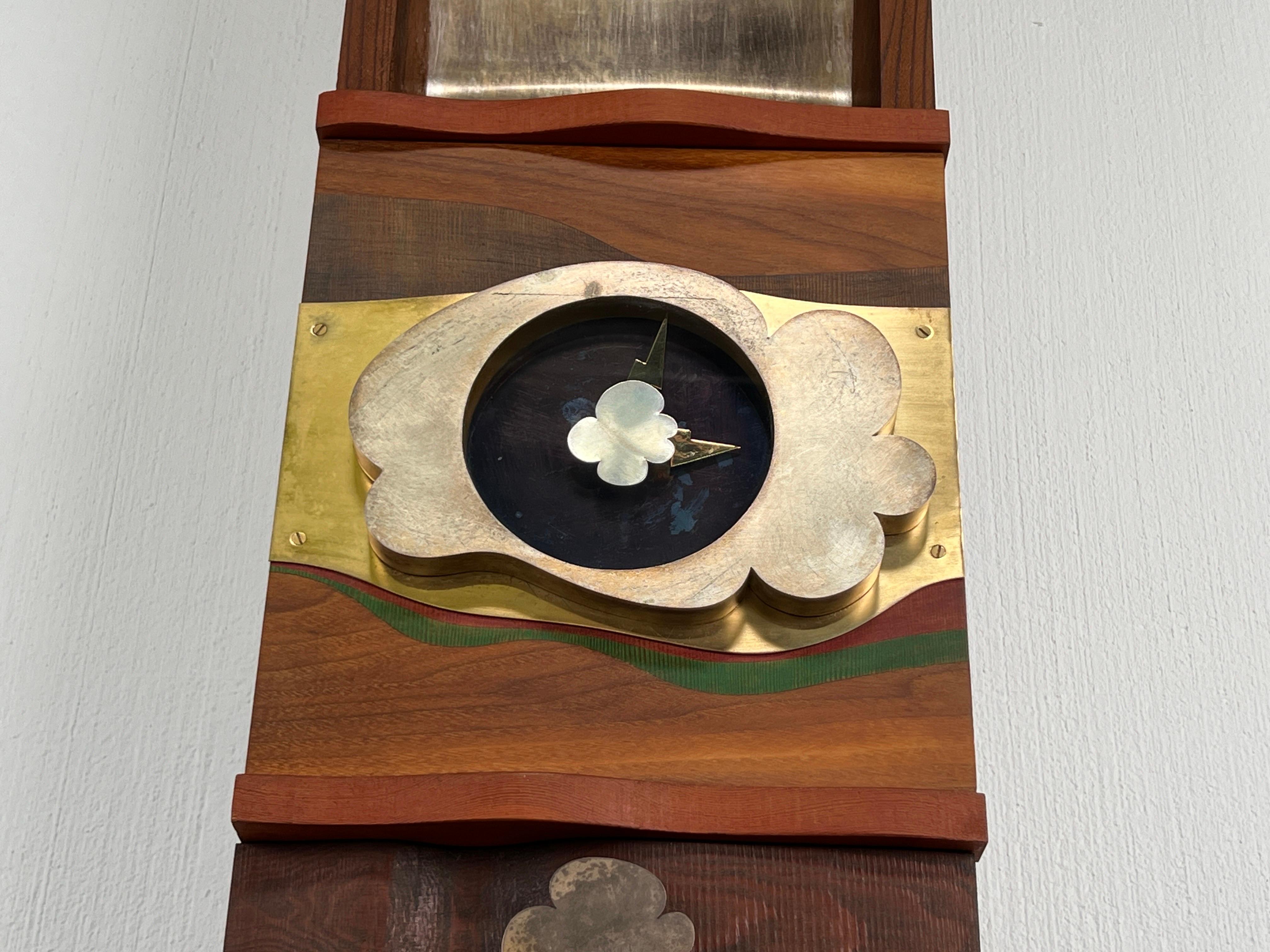 Wall-mounted Clock Cabinet by Garry Knox Bennett 7