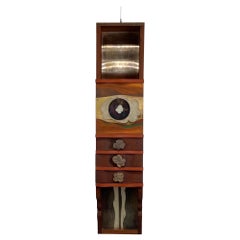 Wall-mounted Clock Cabinet by Garry Knox Bennett