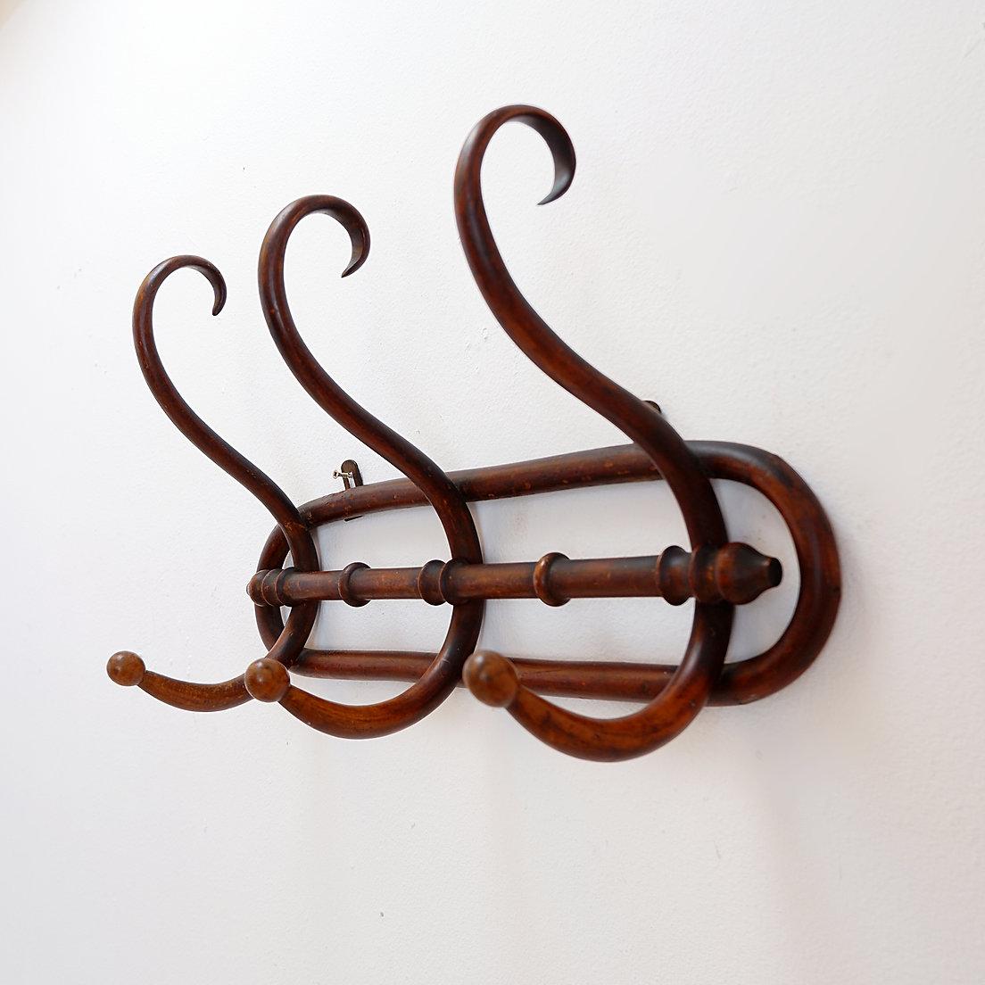 Art Nouveau Wall-mounted coat rack, Thonet style. For Sale