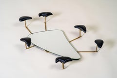 "Perchero de pared con espejo" Por Georges Jouve