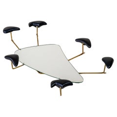"Wall mounted coat rack with mirror" By Georges Jouve