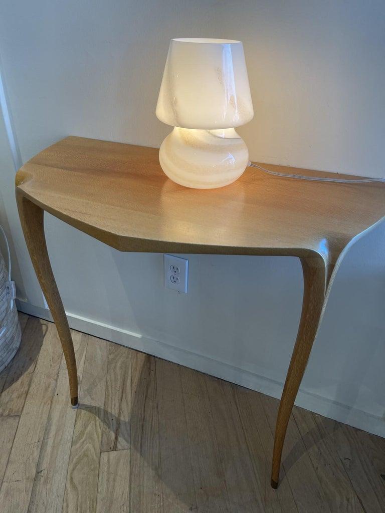 A rare find in this exquisite wall mounted console table by Internationally renowned  American Studio Craftsman, David Ebner. Inspired from the Art Nouveau period a piece that works in may environments, made of Australian Lace Wood.
Crafted in 1998