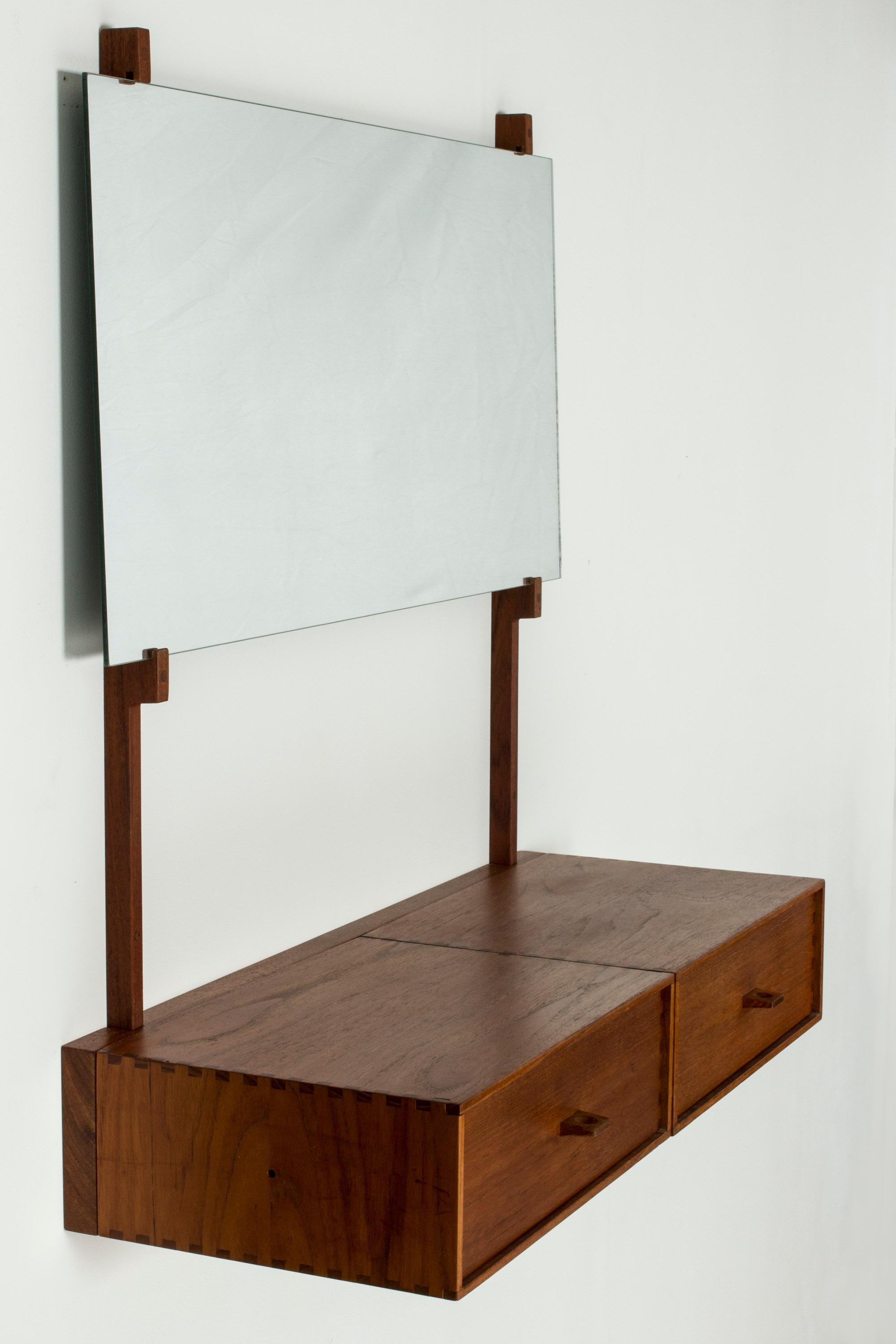 Beautiful wall dressing table by Uno and Östen Kristiansson, made from oak. Cool details in the joinery and the sculpted handles on the drawers.