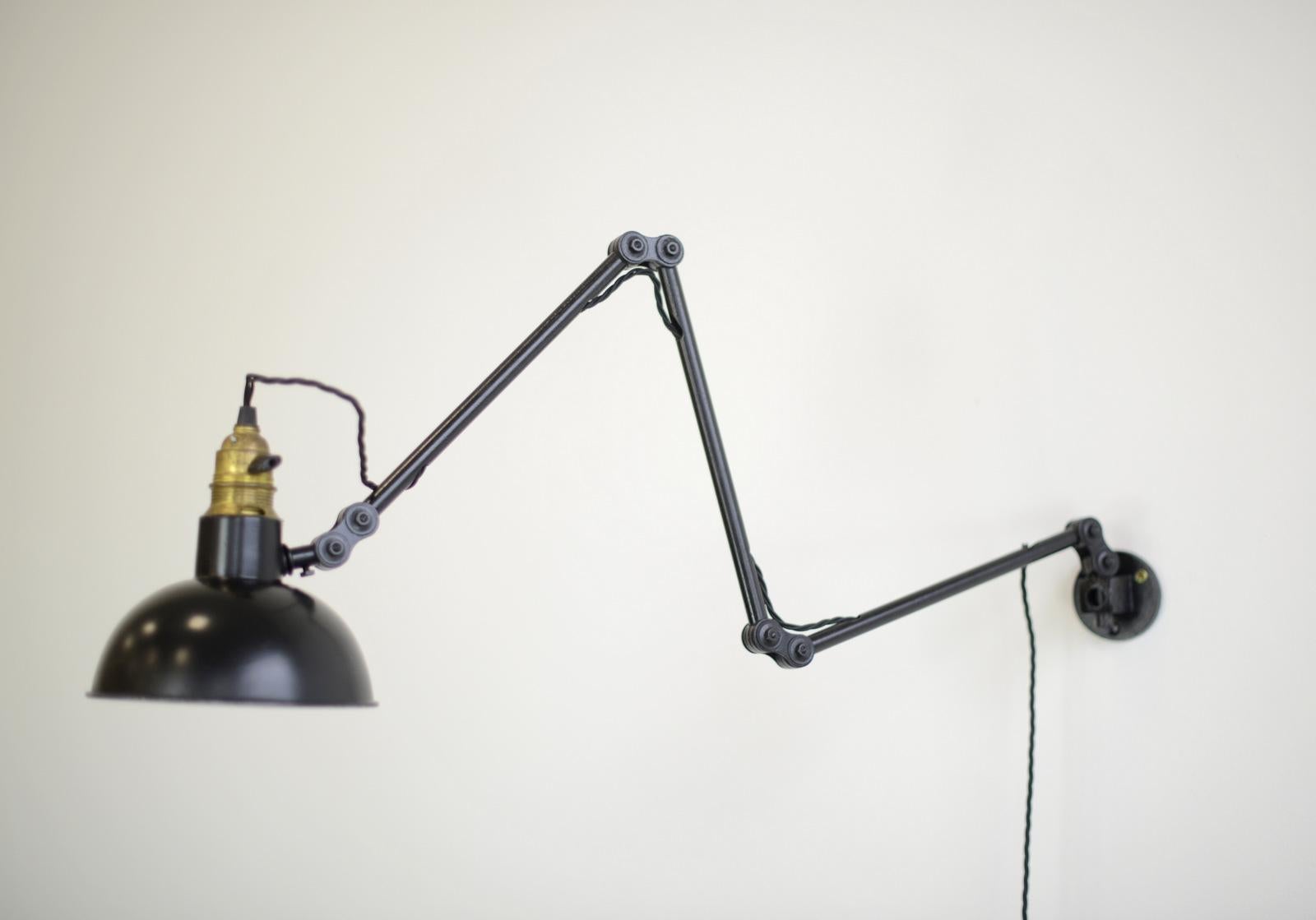 Wall mounted German task lamp, circa 1940s

- Articulated arms
- Aluminium shade
- Original switch on the head of the lamp
- German, 1940s
- Shade measures 18cm wide
- Extends up to 100cm from the wall

Condition report

Fully re wired