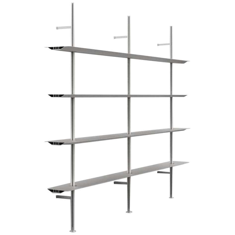 Wall Mounted Hypótila Shelving with Silver Aluminium Finish EX.2

Materials: 
Aluminium

Dimensions: 
D 26 cm x W 250 cm x H 200 cm

The Hypostila shelving was designed in 1979 by Lluis Clotet and Oscar Tusquets to support important amounts