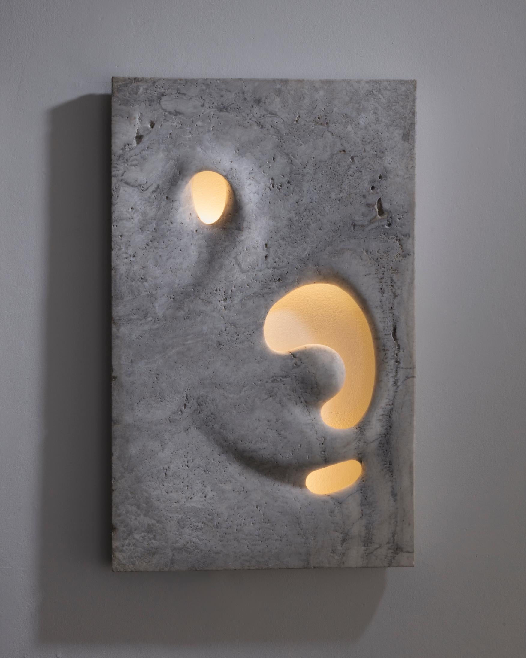 Modern Wall Mounted Illuminated Sculpture in White Travertine by Rogan Gregory, 2016