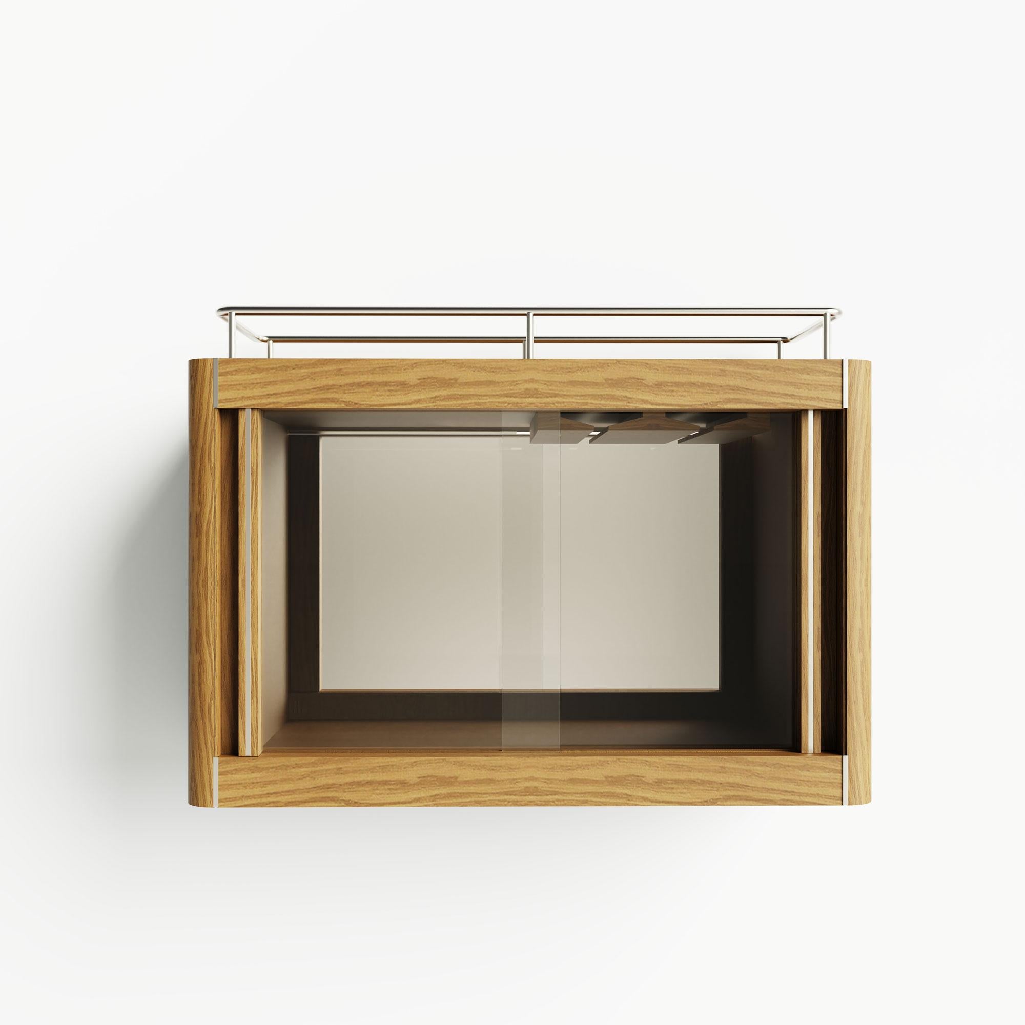 L'armoire à vin minimaliste aux accents chromés - mesurant 80 × 30 × 50 cm - est idéale pour mettre en valeur votre collection d'alcools et de vins. Lorsque vous ouvrez la porte de ce meuble à cocktail éclairé par LED, une surface de préparation