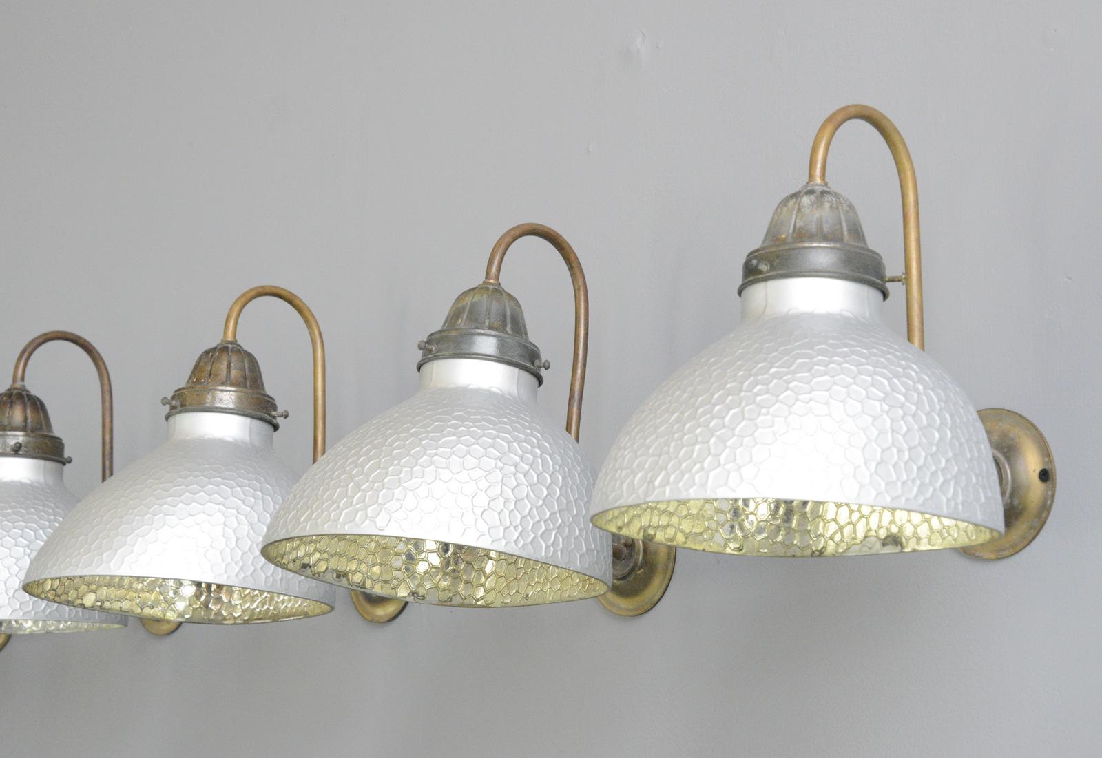 Wall mounted mercury glass lights by Philips, circa 1930s

- Price is per light (5 available)
- Copper arms
- Mercury glass
- Takes E27 fitting bulbs
- Made by Phillips, Eindhoven
- Dutch, 1930s
- Measures: 22cm wide x 32cm tall x 29cm