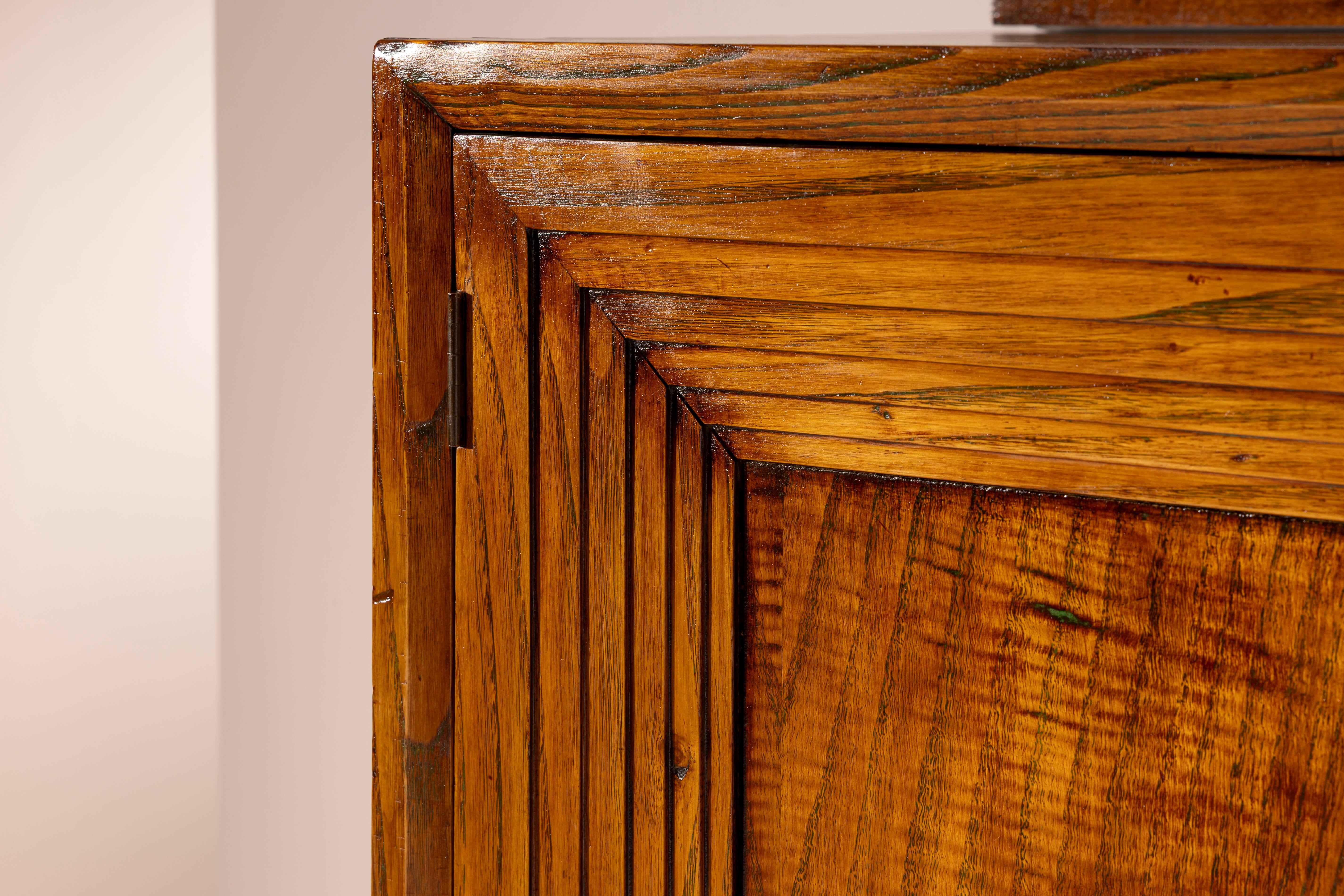 Italian Wall-mounted oak wood sideboard with four doors, Italy, 1950s For Sale