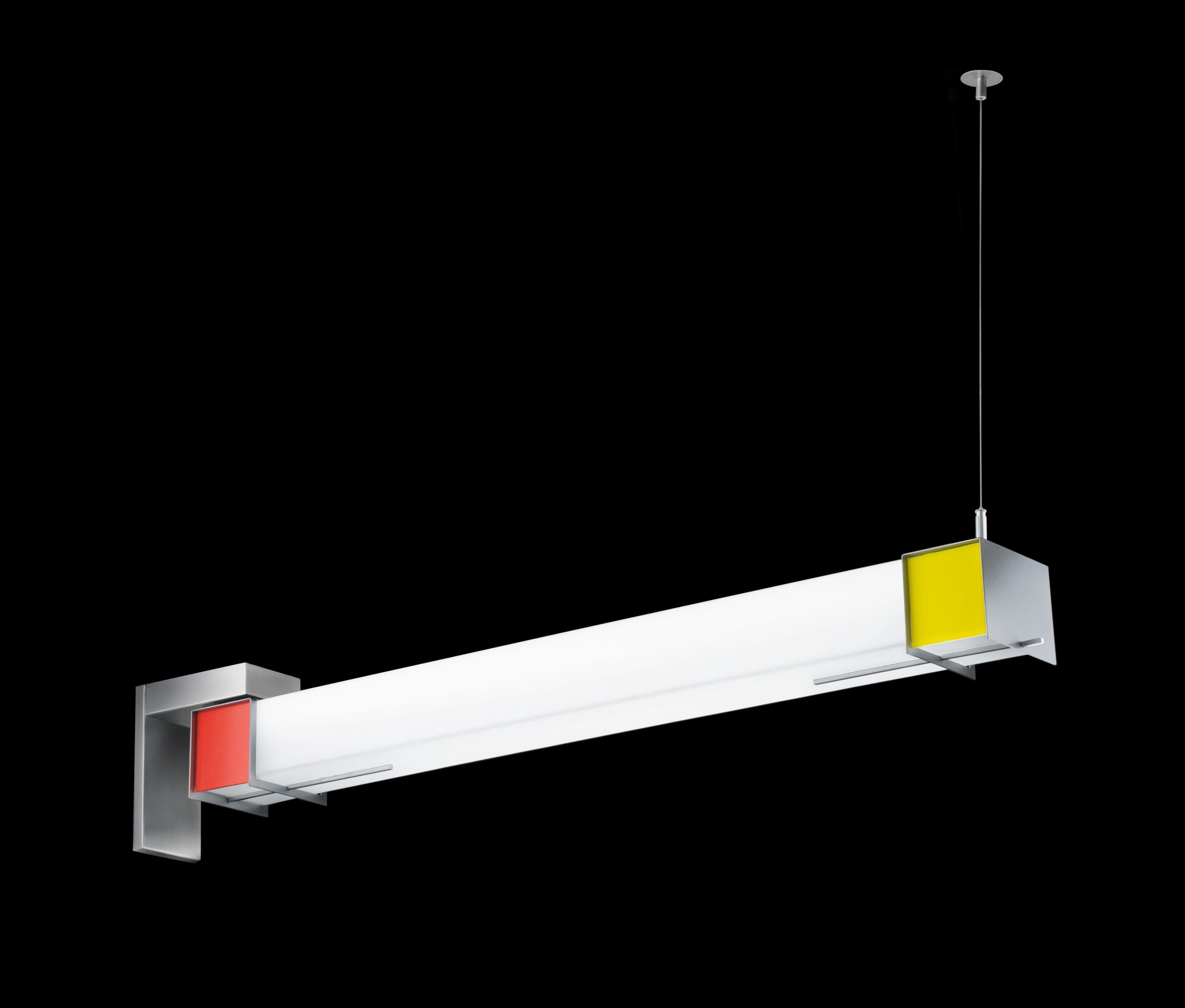 Unique wall-mounted pendant with white glass diffuser and painted steel housing. Red, yellow and blue acrylic details. In the manner of Mid-Century Modern. LED Lamped, 3000k standard color temperature. Great for use in pairs.

Architect, Sandy