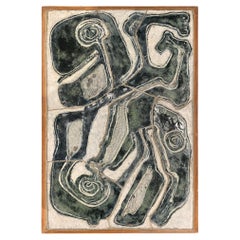 Wall-mounted relief in glazed stoneware by Birte Weggerby