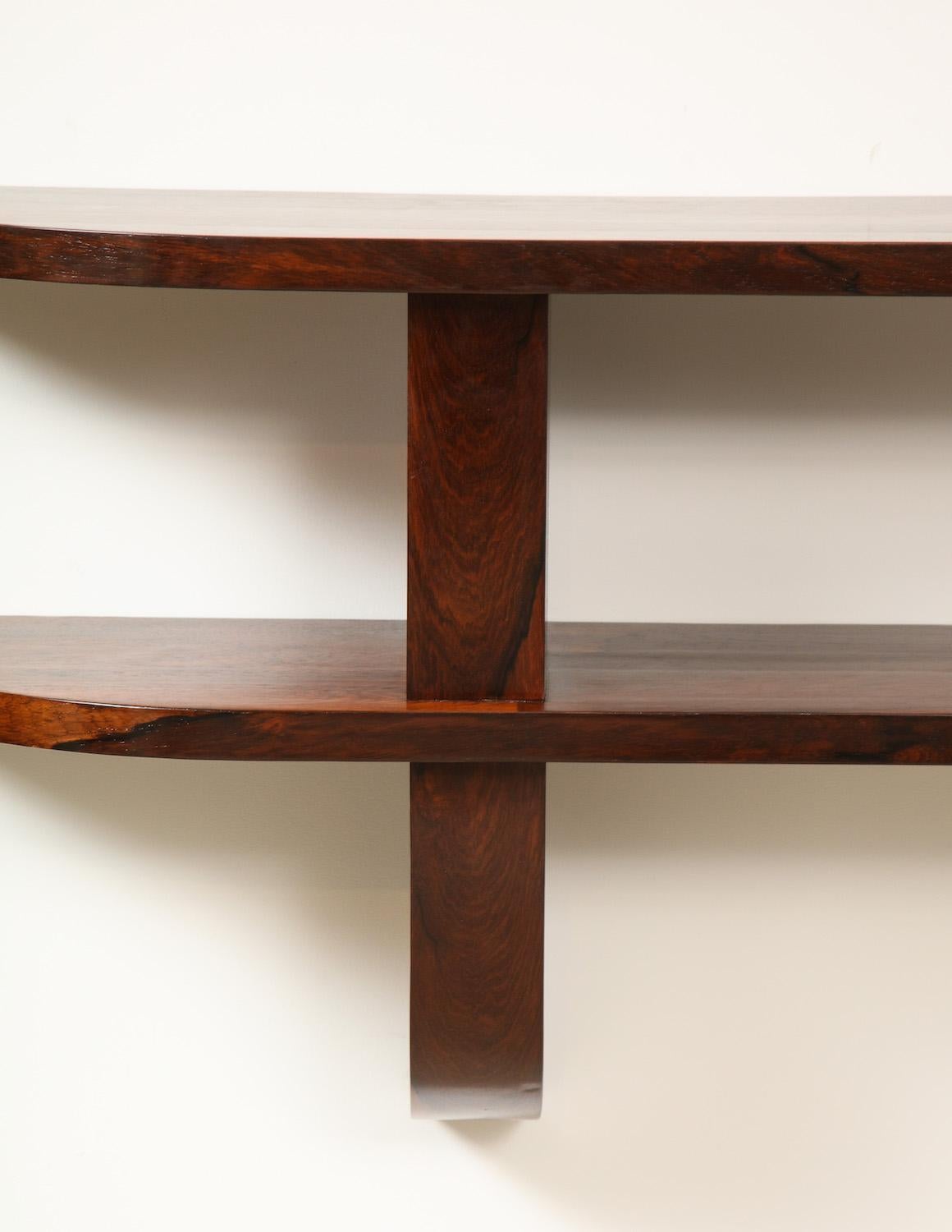 Architectural open shelf of rosewood. Easy mounting system on rear. Recently refinished.