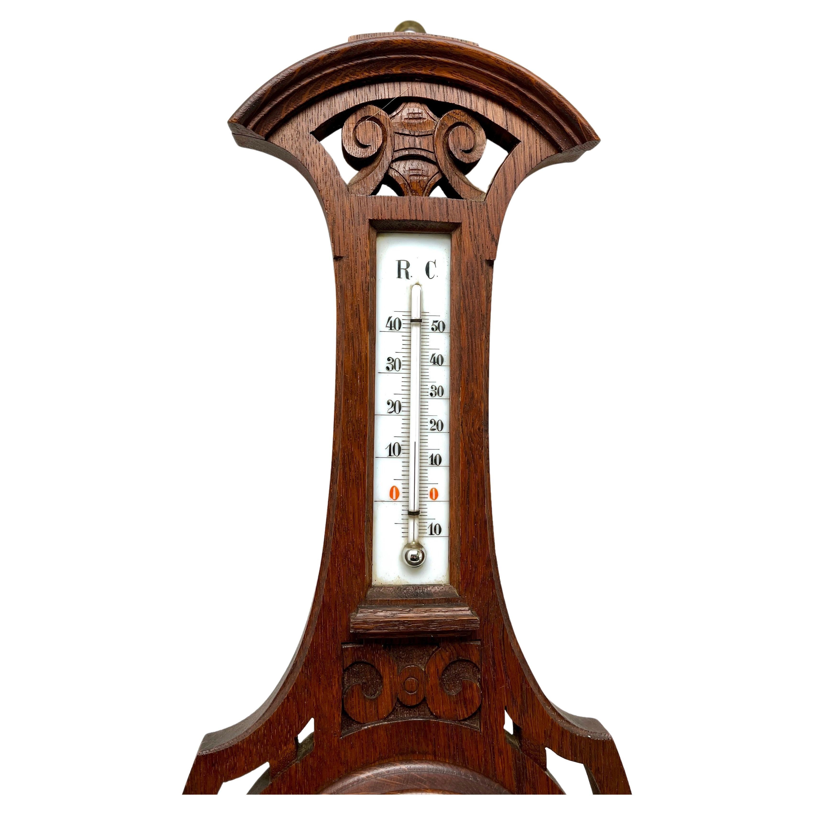 Wall-Mounted Weather Station in Art Nouveau Style Carved Oak By R. Krengel 1910s  Eupen Belgium
High quality mechanism with jeweled movement barometer and thermometer (in centigrade)
Unusual design with high relief C-scrolls and Flowers
 (from