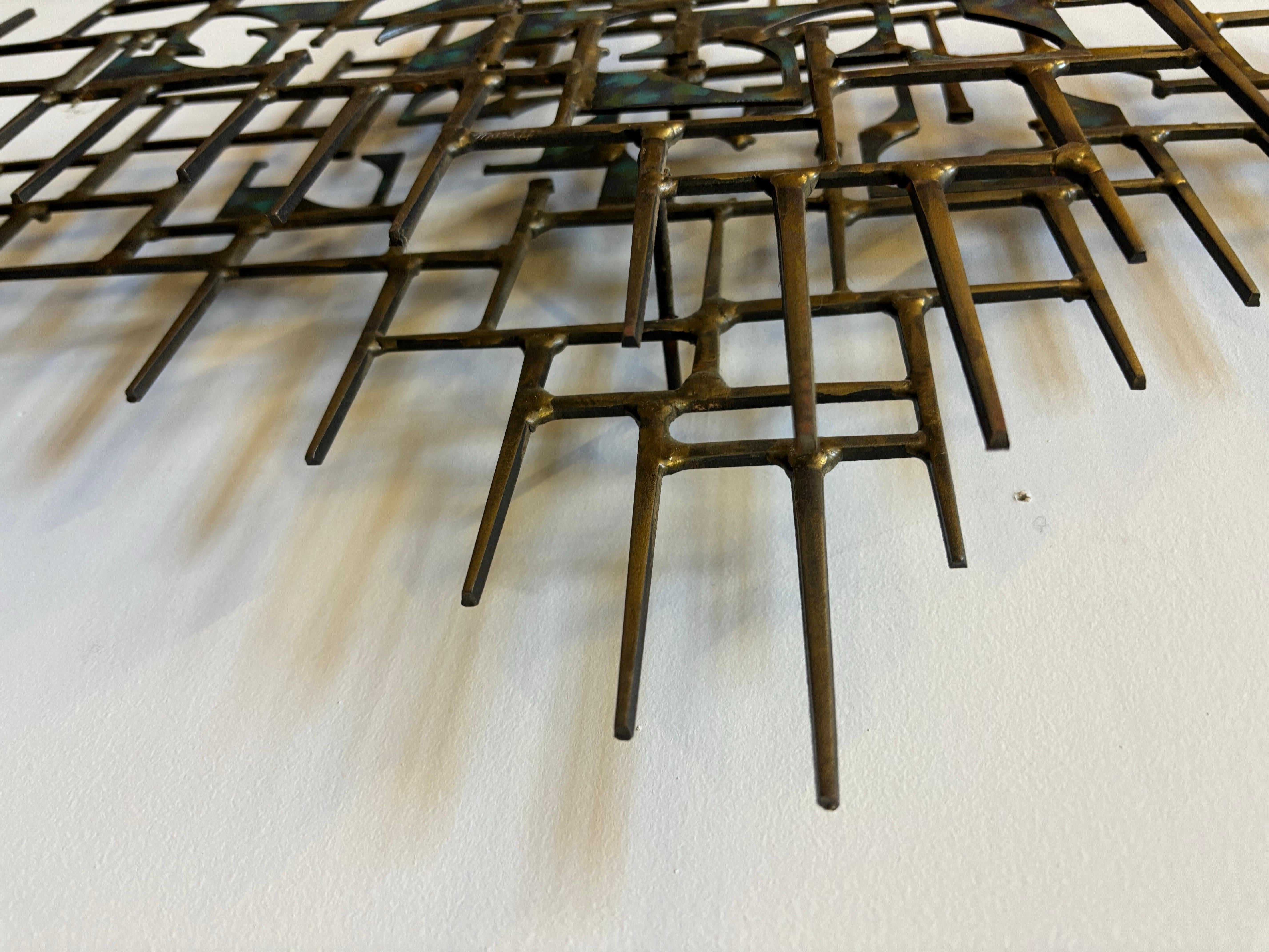 Nail Sculpture with shades of gold and blue applied.  Signed Maxl 77.  In the style or influenced by Jere' Artisan House or William Bowie.  Nice size and scale.  Overall in very nice shape!  Can be hung vertical or Horizontal!