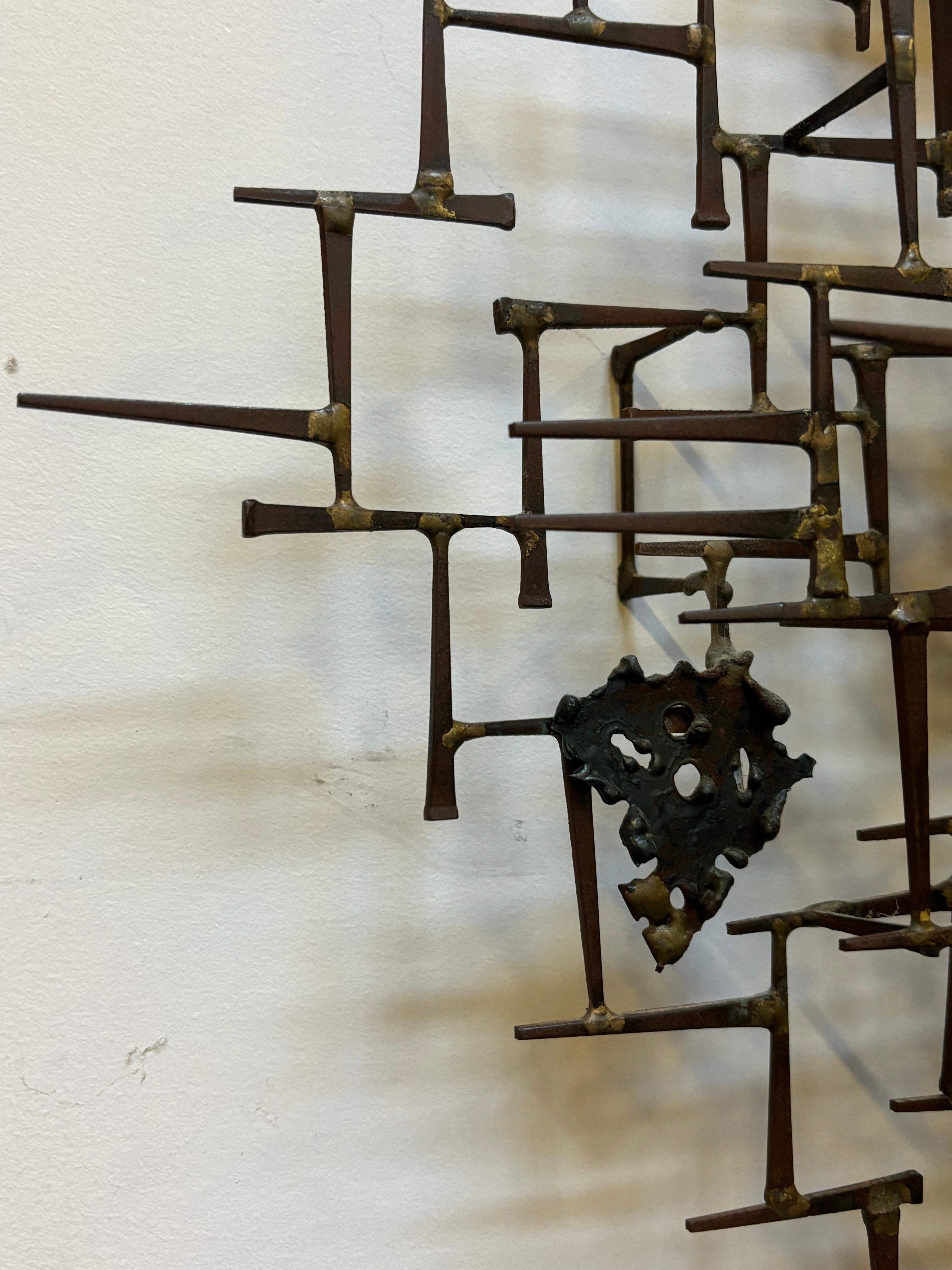 Escultura de uñas de pared Estadounidense