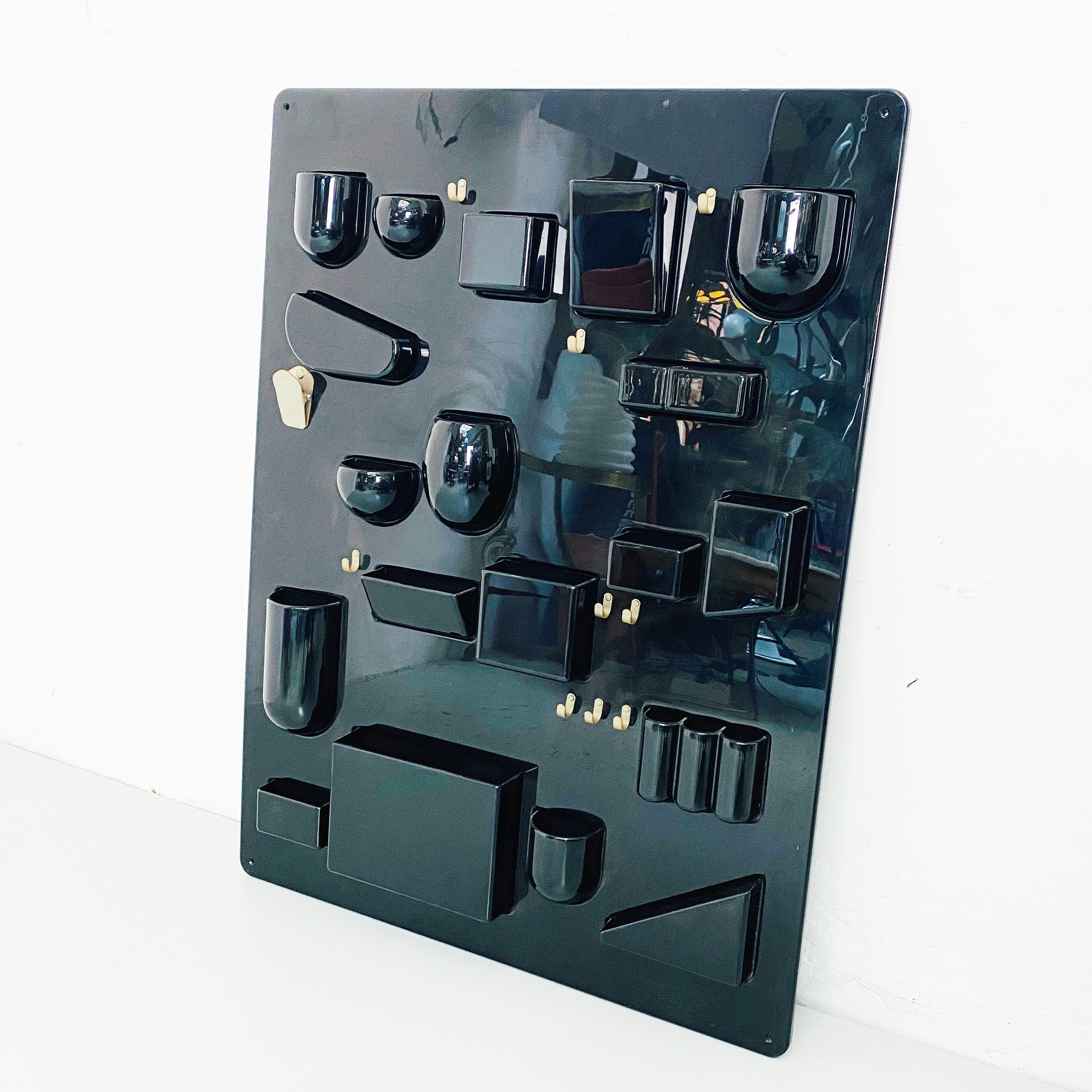 Black plastic wall object organizer designed by Dorothee Becker for Design M Ingo Maurer, 1969
Wall object holder in glossy black abs and hooks in nickel-plated metal, designed by Dorothee Becker and produced by Design M Ingo Maurer in 1969, still