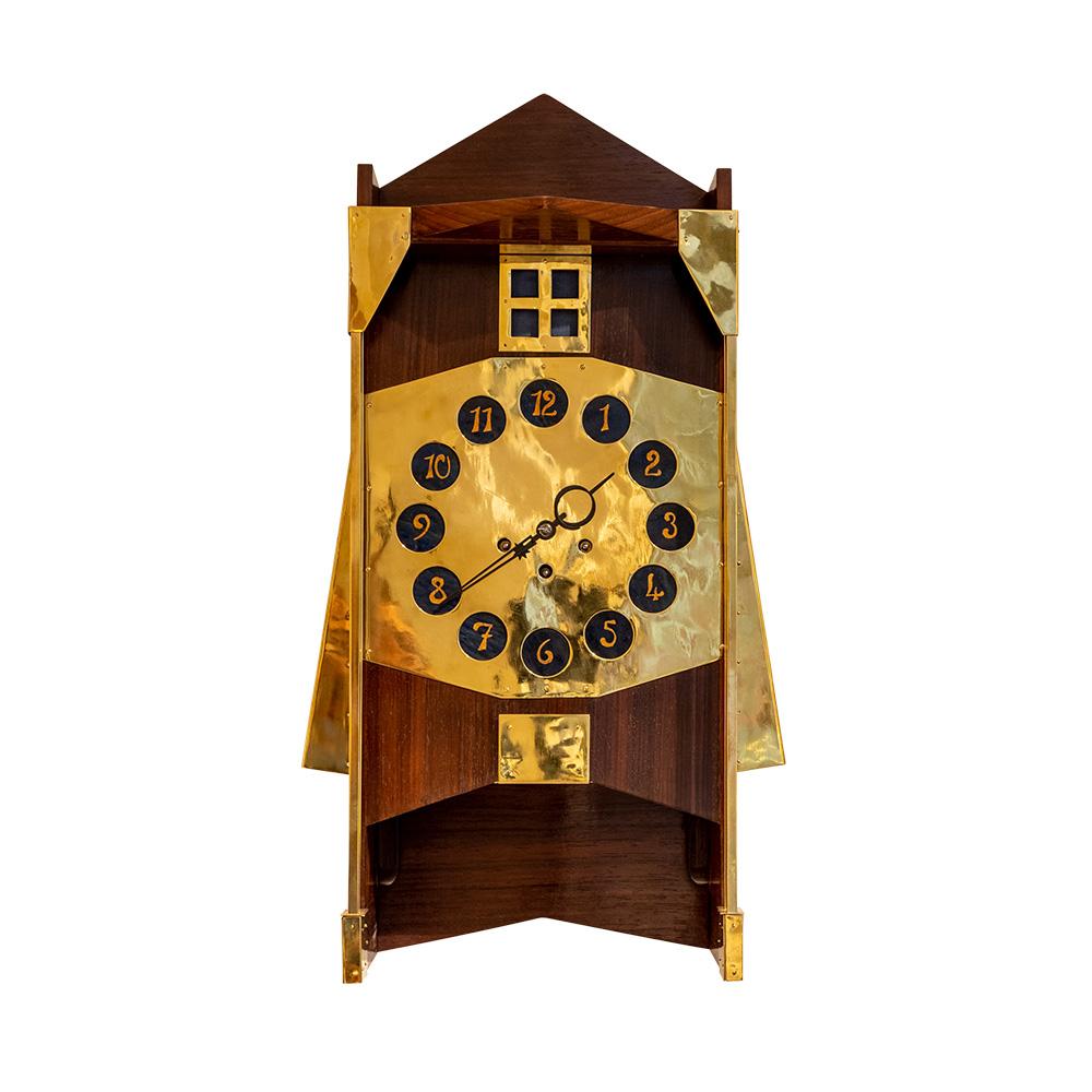 Wall or table clock by Gustave Serrurier-Bovy, Belgian Art Nouveau, African padouk wood, polished brass, Loetz-glass inlays, circa 1907

Gustave Serrurier-Bovy, a Belgian designer and architect, was one of the pioneers of Art Novueau. His work was