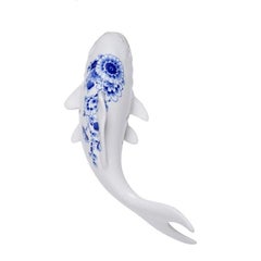 Wall or table decoration of three ceramic Delfts Blue swimming fish