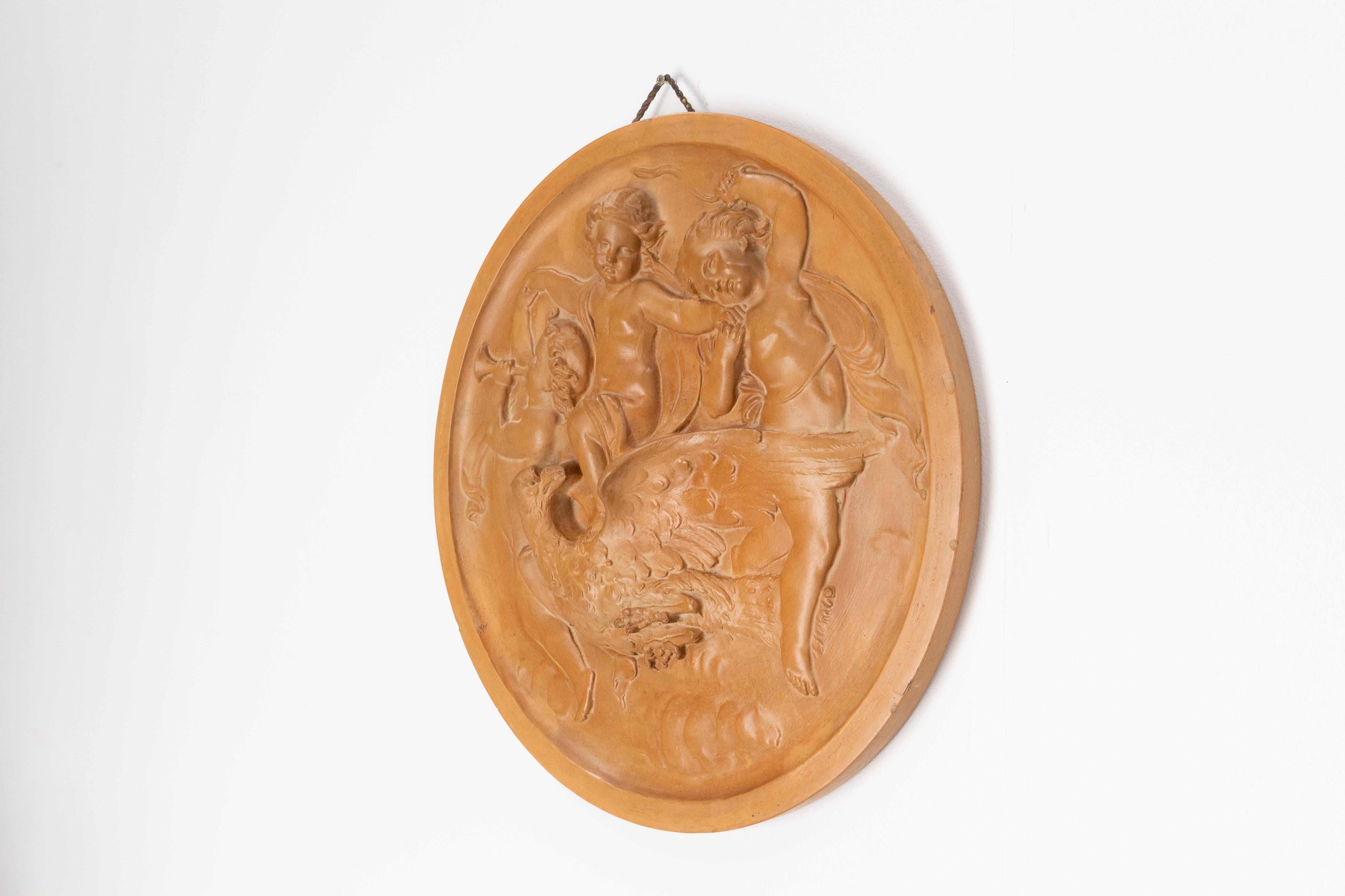 French Wall Plaque Sculpture Medallion Three Putti and Eagle, circa 1920 For Sale
