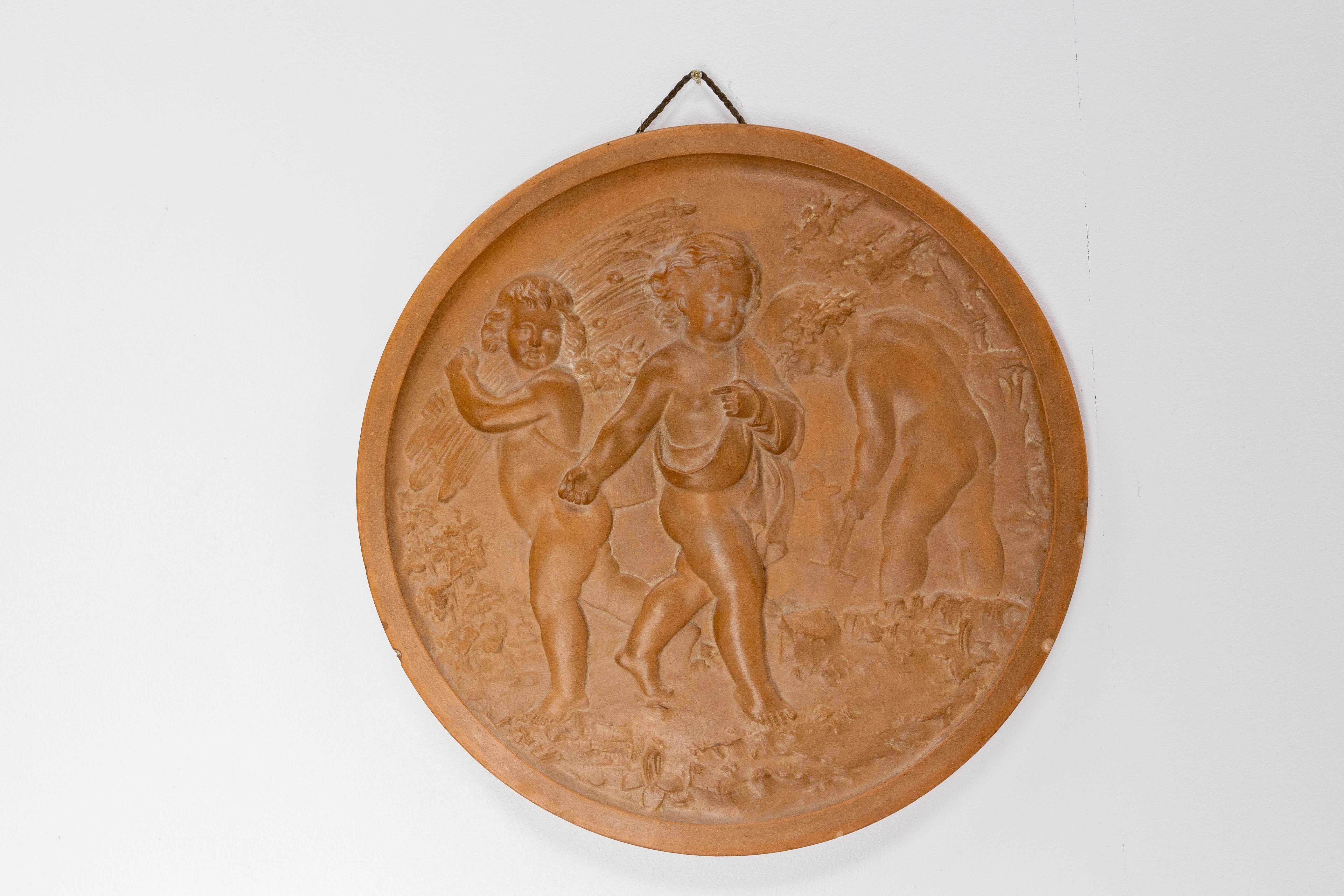 Terracotta medallion representing three putti  in agricultural scenes: turning the land, sowing and harvesting
Wall plaque
Good condition with good patina due to age.
If you want to make a pair for your decoration, we have a second medallion