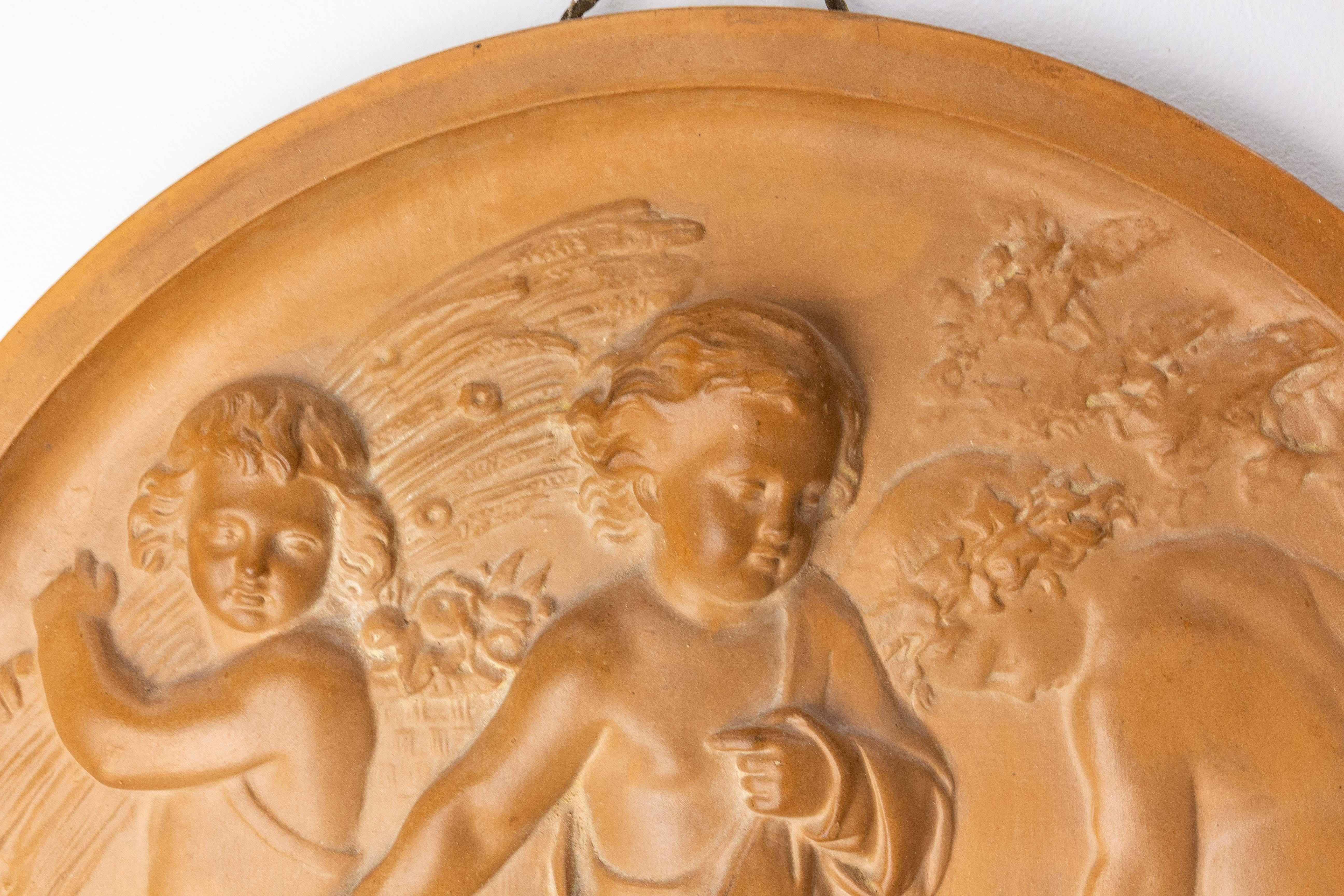 Early 20th Century Wall Plaque Sculpture Medallion Three Putti in Agricultural Scenes, circa 1920 For Sale