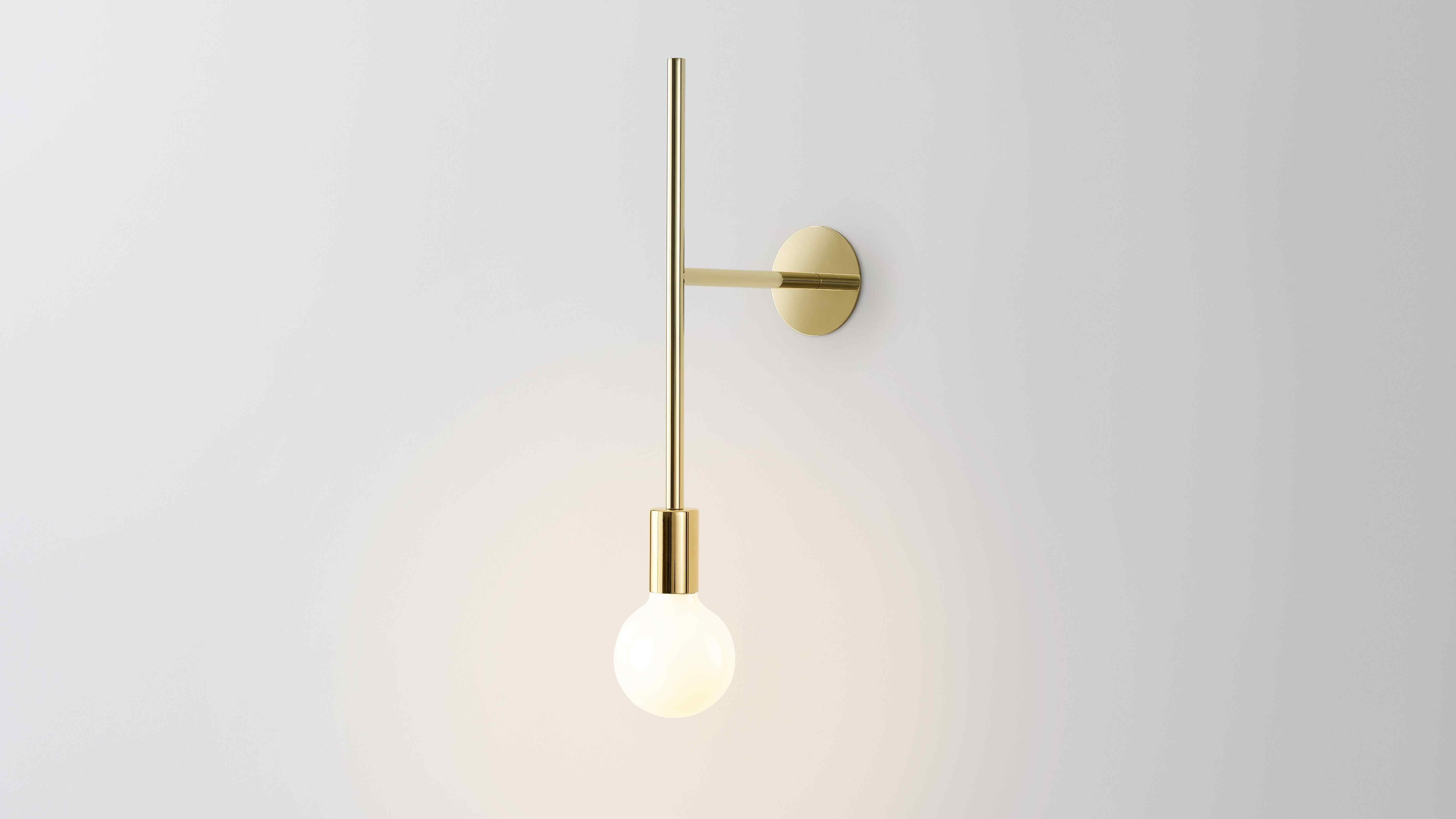 Wall powered wall step by Volker Haug
Dimensions: W 24.8 x H 55 cm
Materials: Polished, bronzed brass or steel
Finish: Raw, satin lacquer or powdercoat
Weight: approximately 1.2 kg

Lamp: 240V E27 (120V E26 US) 
Custom finishes available on