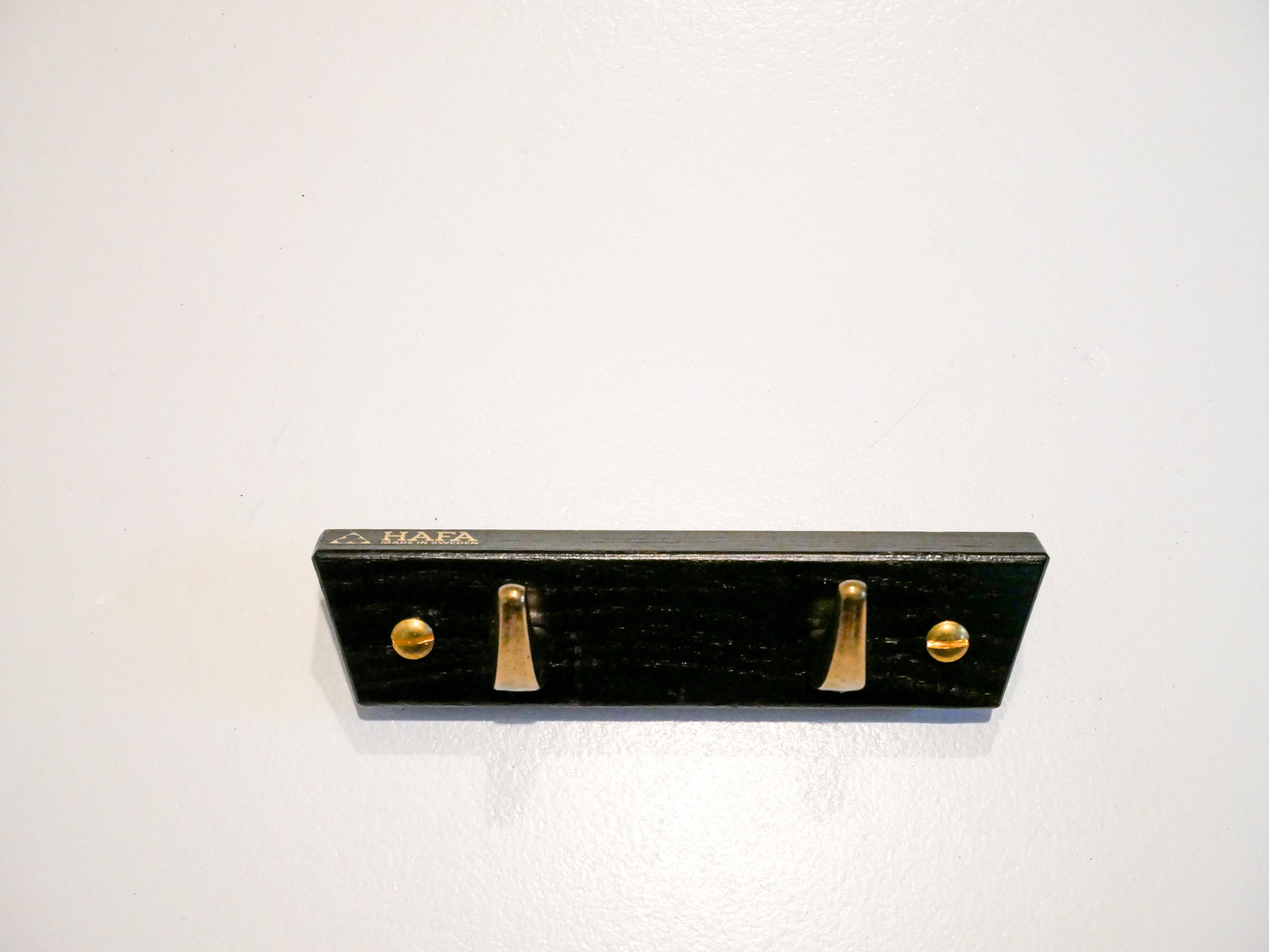 Amazing rack in a rare black edition with brass hooks model 