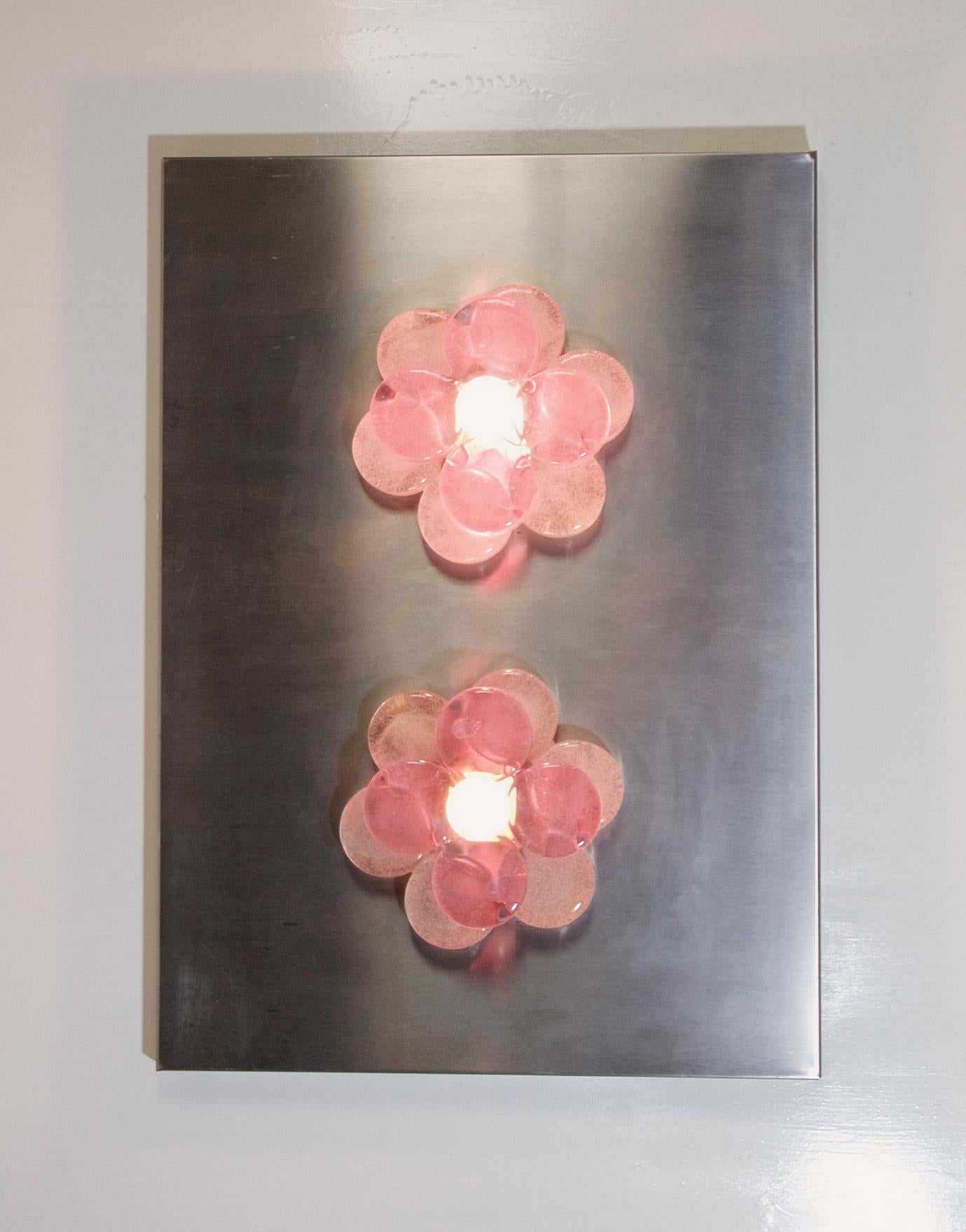 Un'originale applique di Albano Poli per Poliarte in stile iconico della cultura pop. Originale in tutti i dettagli e con elettricità funzionante. Quando si accende, emette una luce bellissima. Le lampadine utilizzate sono di tipo E14.