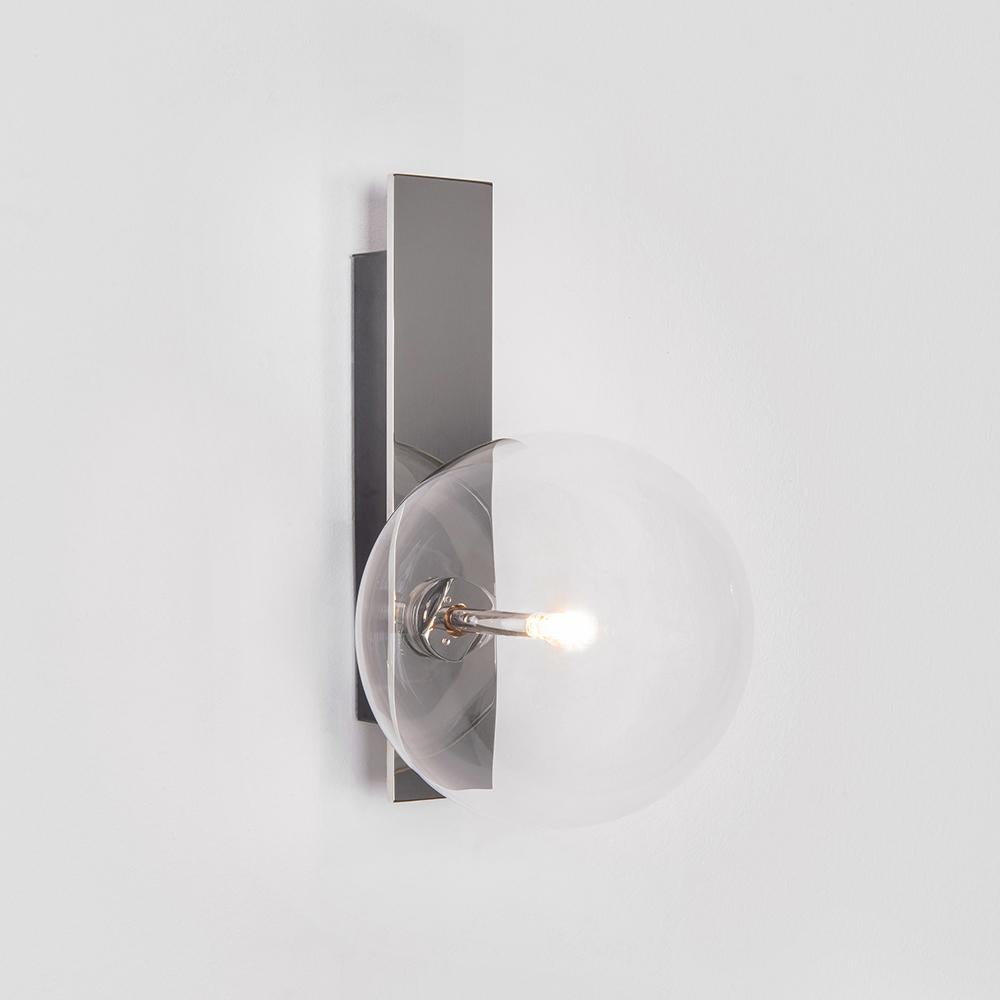 Oslo Wall sconce by Schwung
Dimensions: W 15 x D 19 x H 26 cm
Materials: Polished nickel, hand blown glass globes

Finishes available: Black gunmetal, polished nickel, brass
Other sizes available.

 Schwung is a german word, and loosely defined,