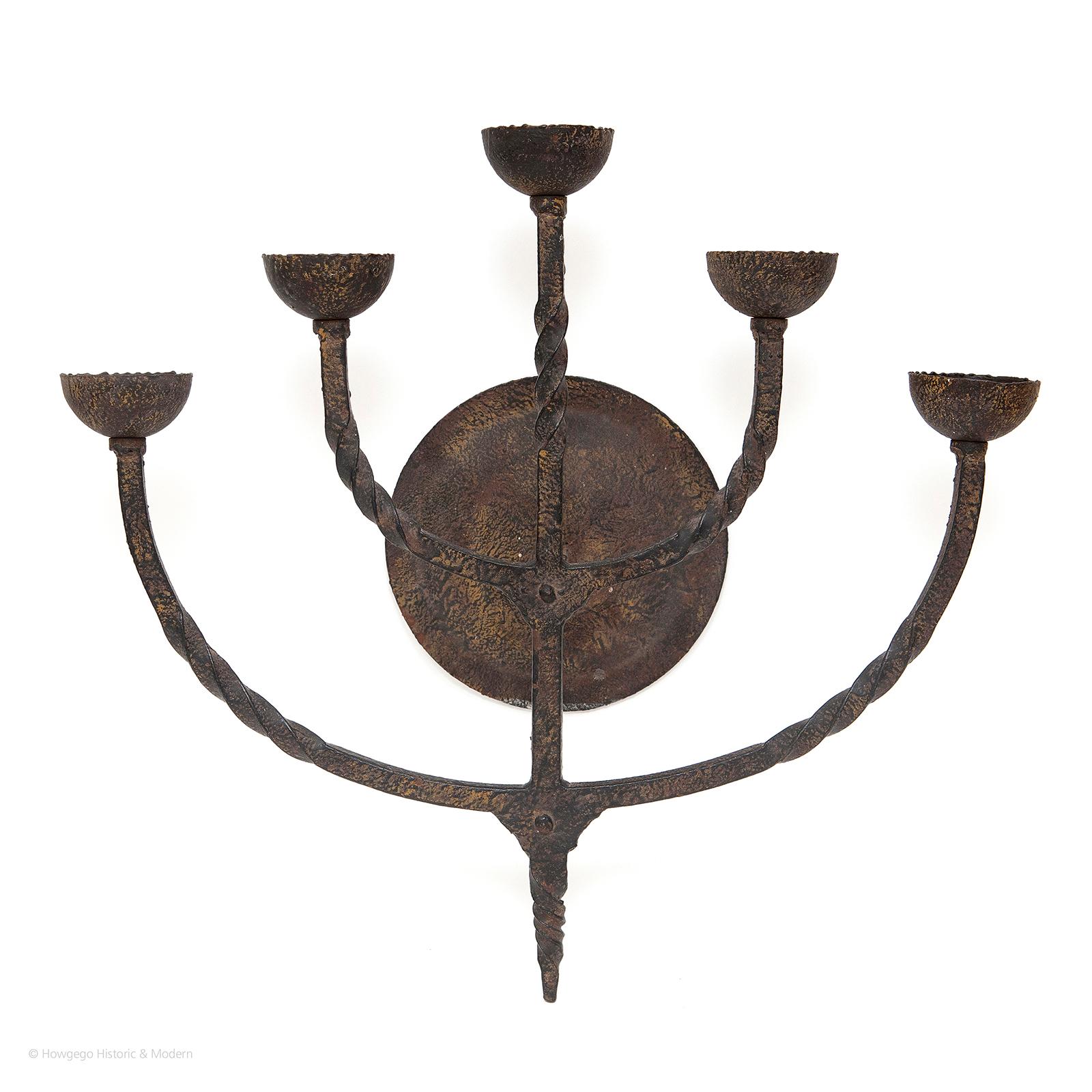 19th century, French, wrought iron, 5 arm/branch, baronial, wall sconce, 17½“ high
Atmospheric, wall sconce with baronial gravitas
The 5 arms have the capacity to create a lot of light. Could be wired.
Classic simplicity with the twisted arms and