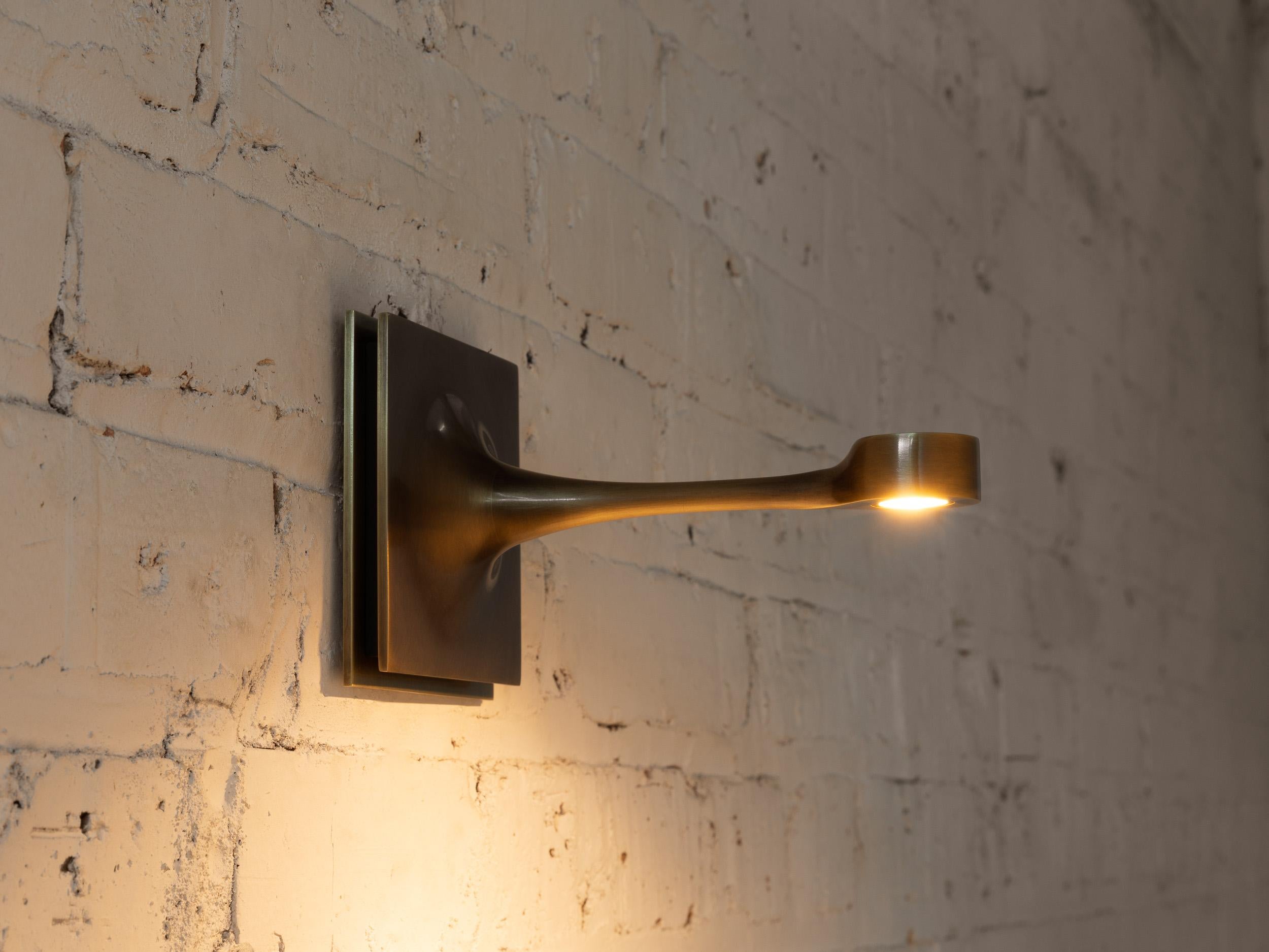 Modern Wall Sconce with a Long Taper For Sale