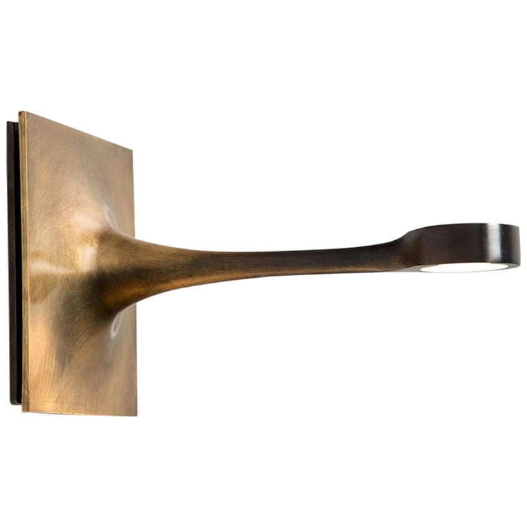 Wall Sconce with a Long Taper For Sale