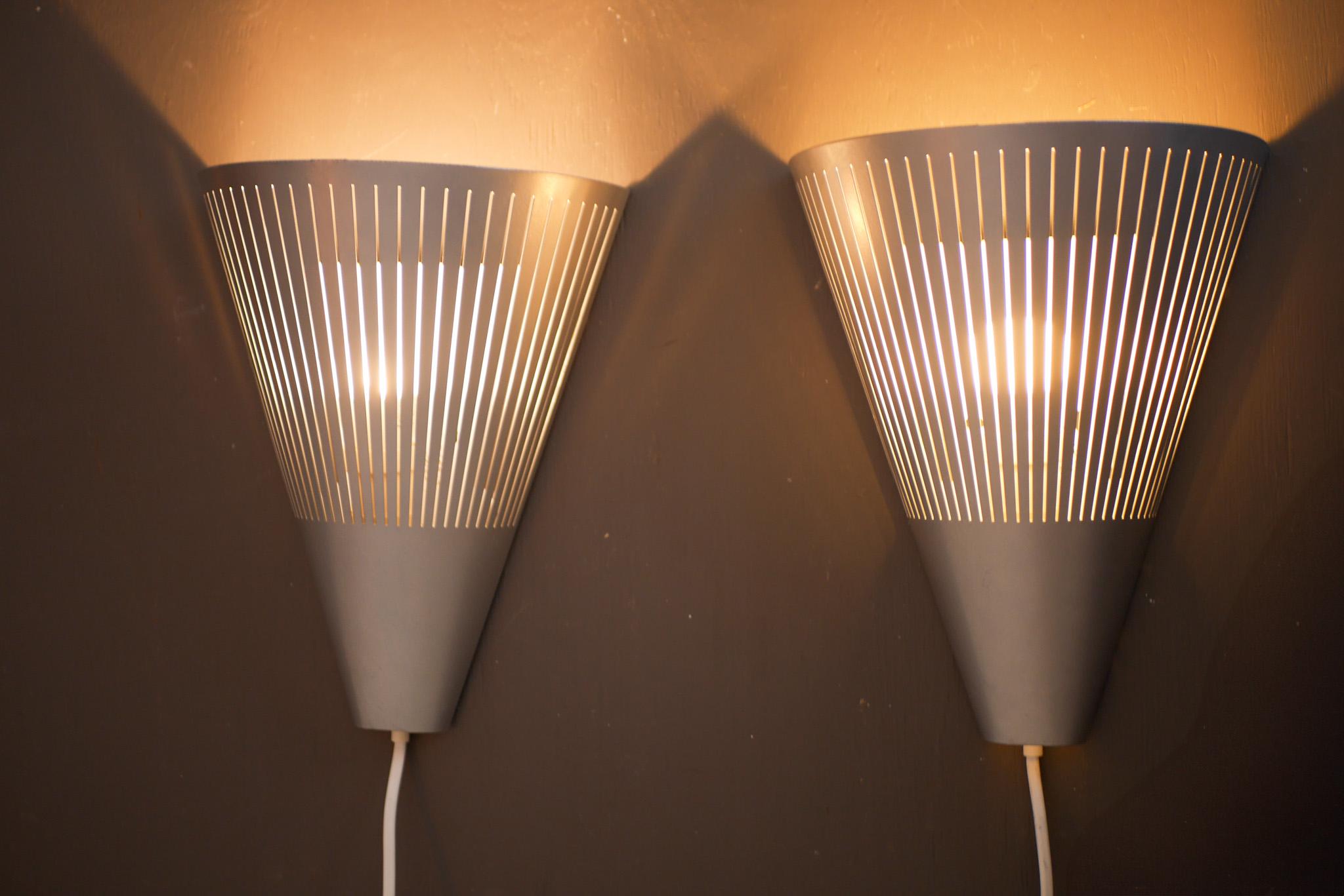 Mid-Century Modern Wall sconces, a pair vintage 1980s Scandinavian Ikea wall lights known as Klyka For Sale